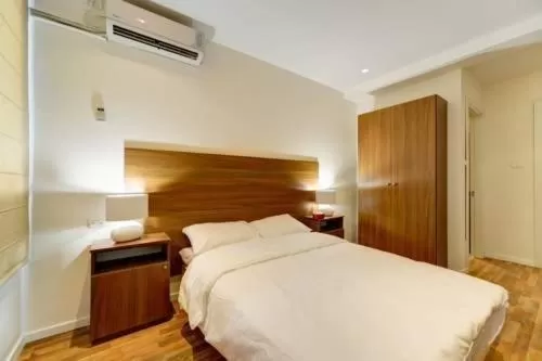 Bed in Central Laguardia Hotel