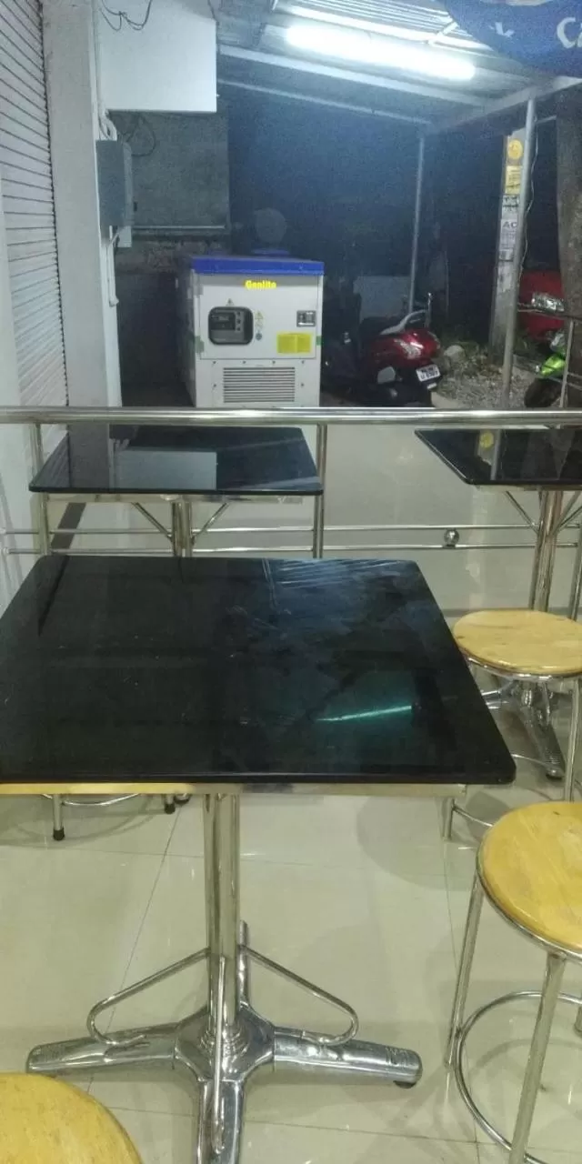 Kitchen/Kitchenette in Anandan Tourist Home