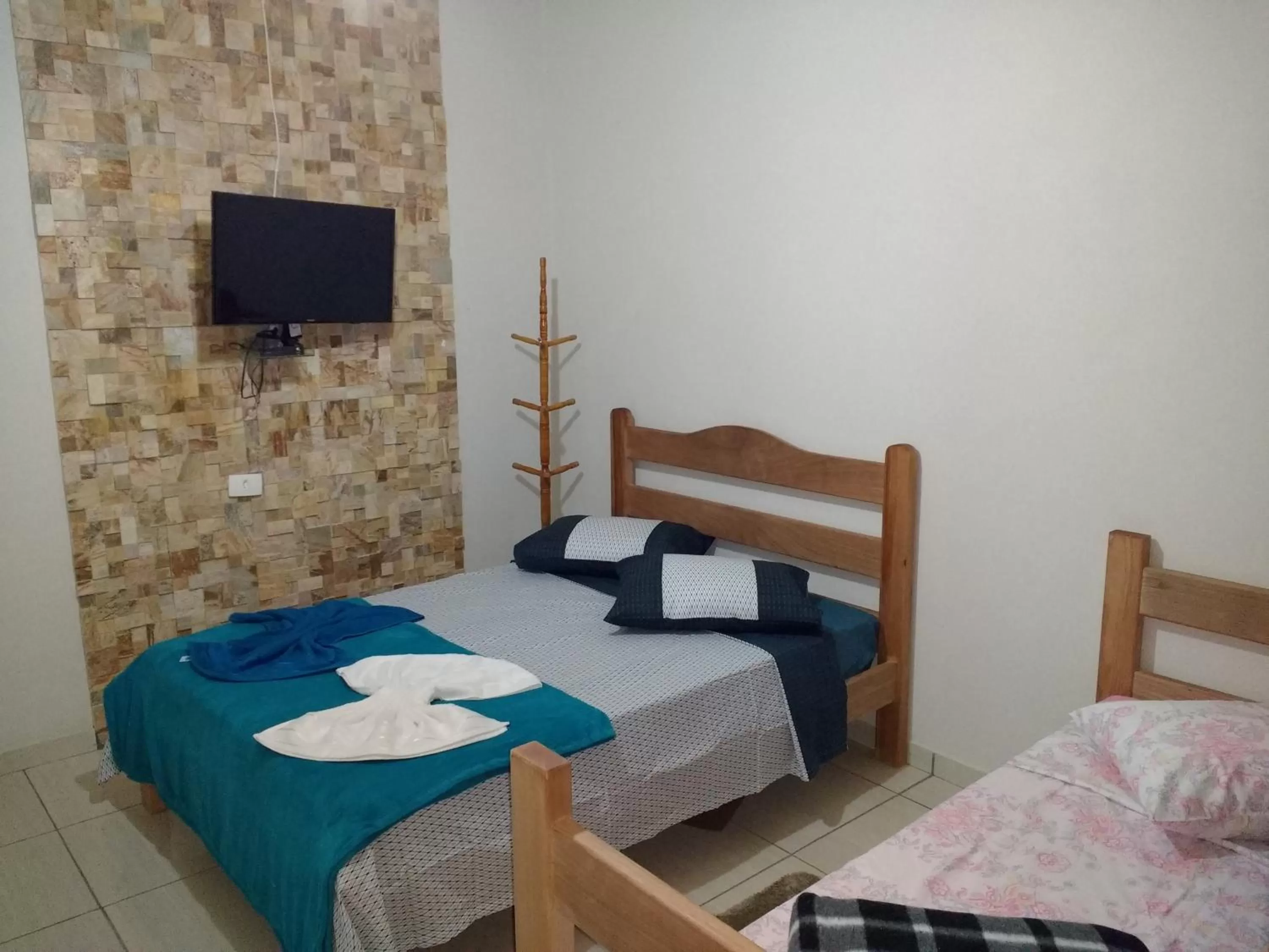 Bed in Pousada e Chales Por do Sol