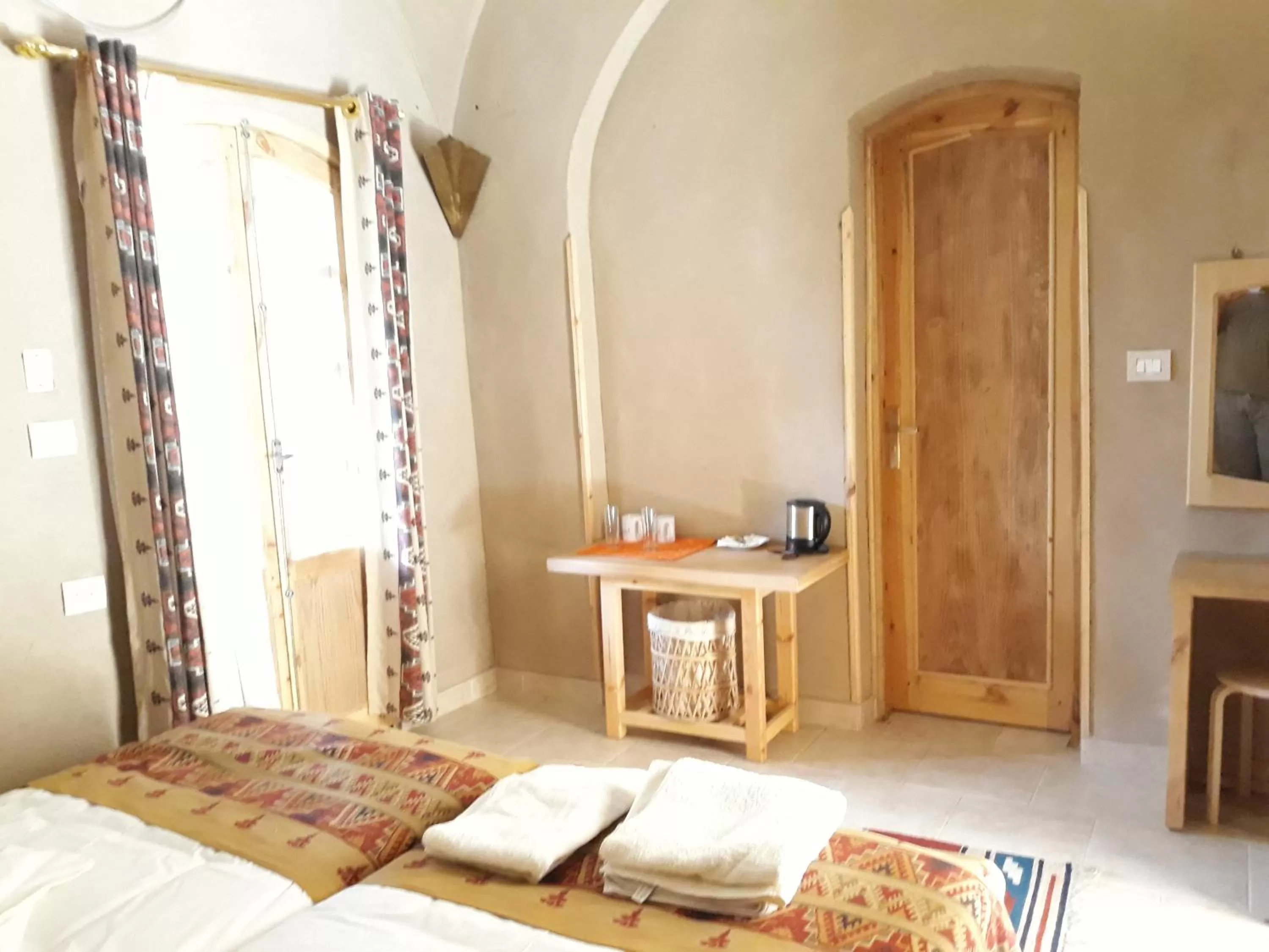 Bed in Embrace Hotel