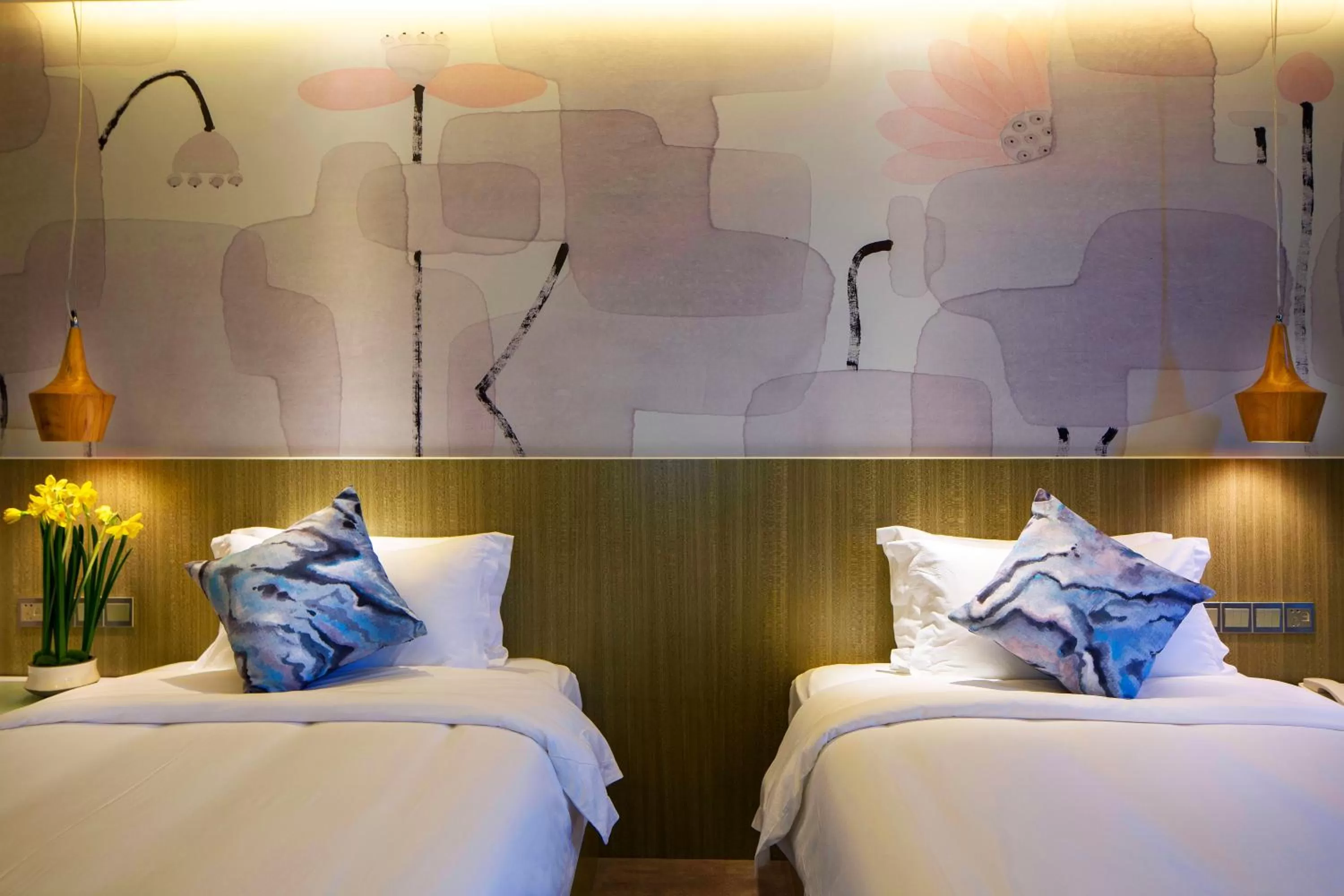 Bed in Paco Hotel Gangding Metro Guangzhou