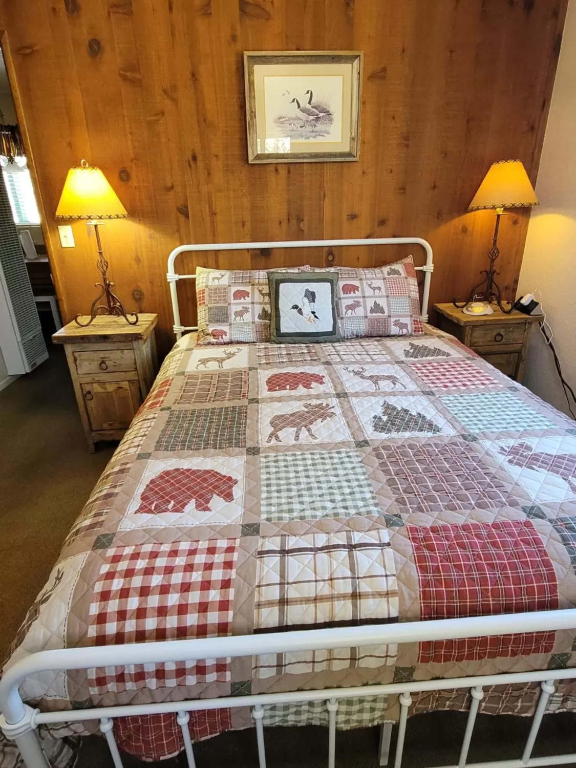 Bed in Hillcrest Suites & Cabins