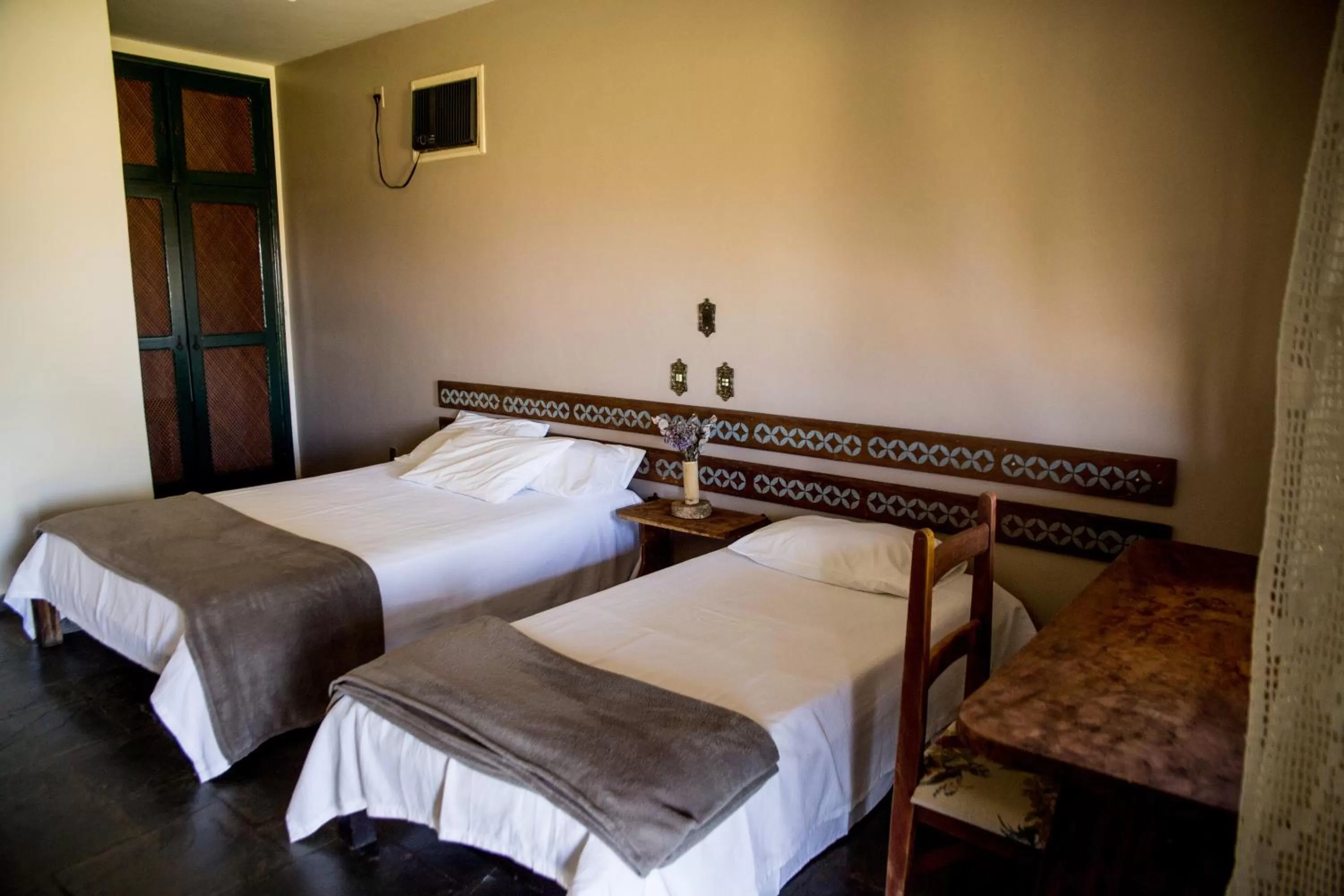 Bed in Pousada Flor da Serra