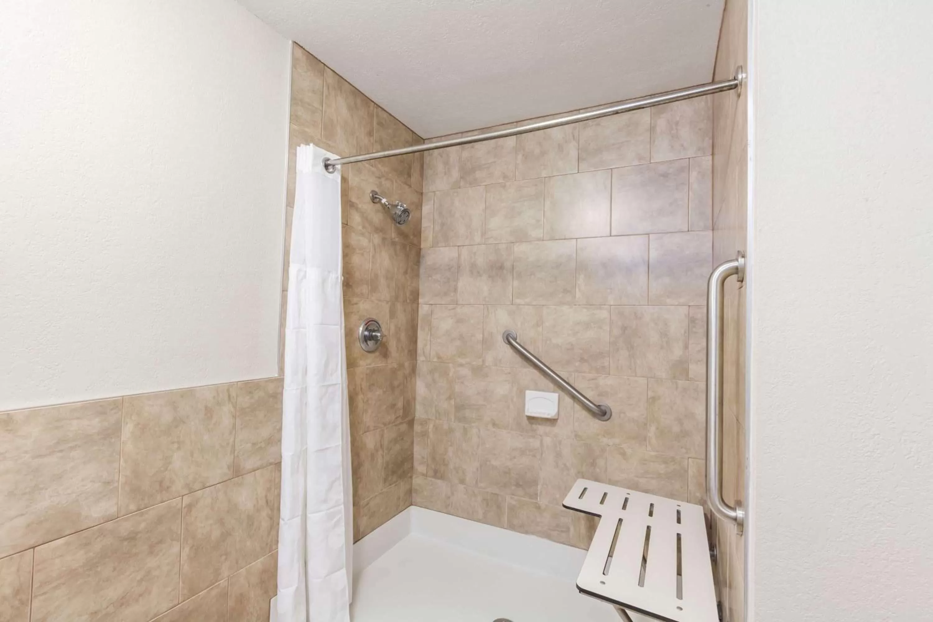 Shower in Ramada by Wyndham New Iberia