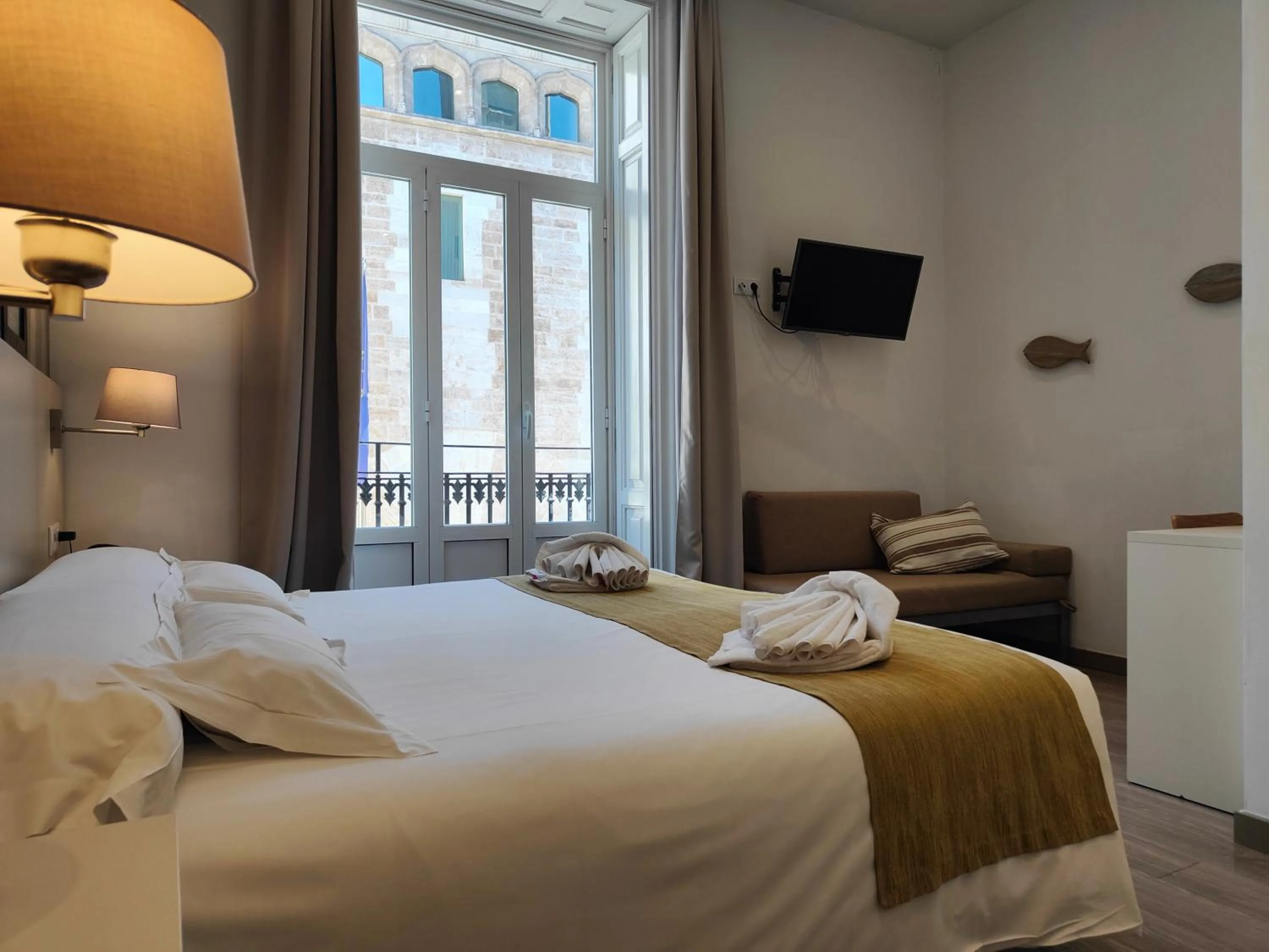 Bed in Hotel San Lorenzo Boutique Plaza