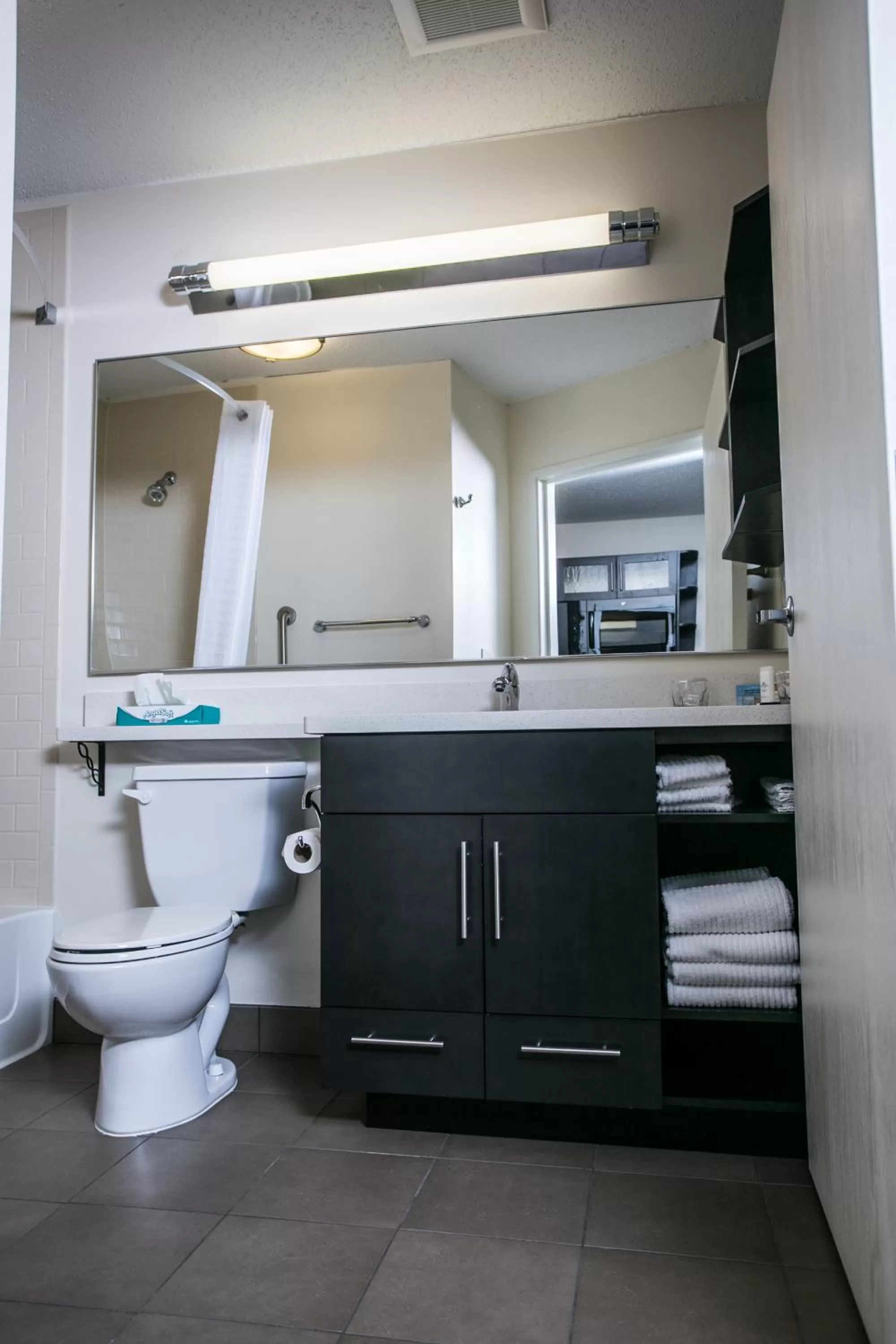 Bathroom in Candlewood Suites Fargo-North Dakota State University by IHG