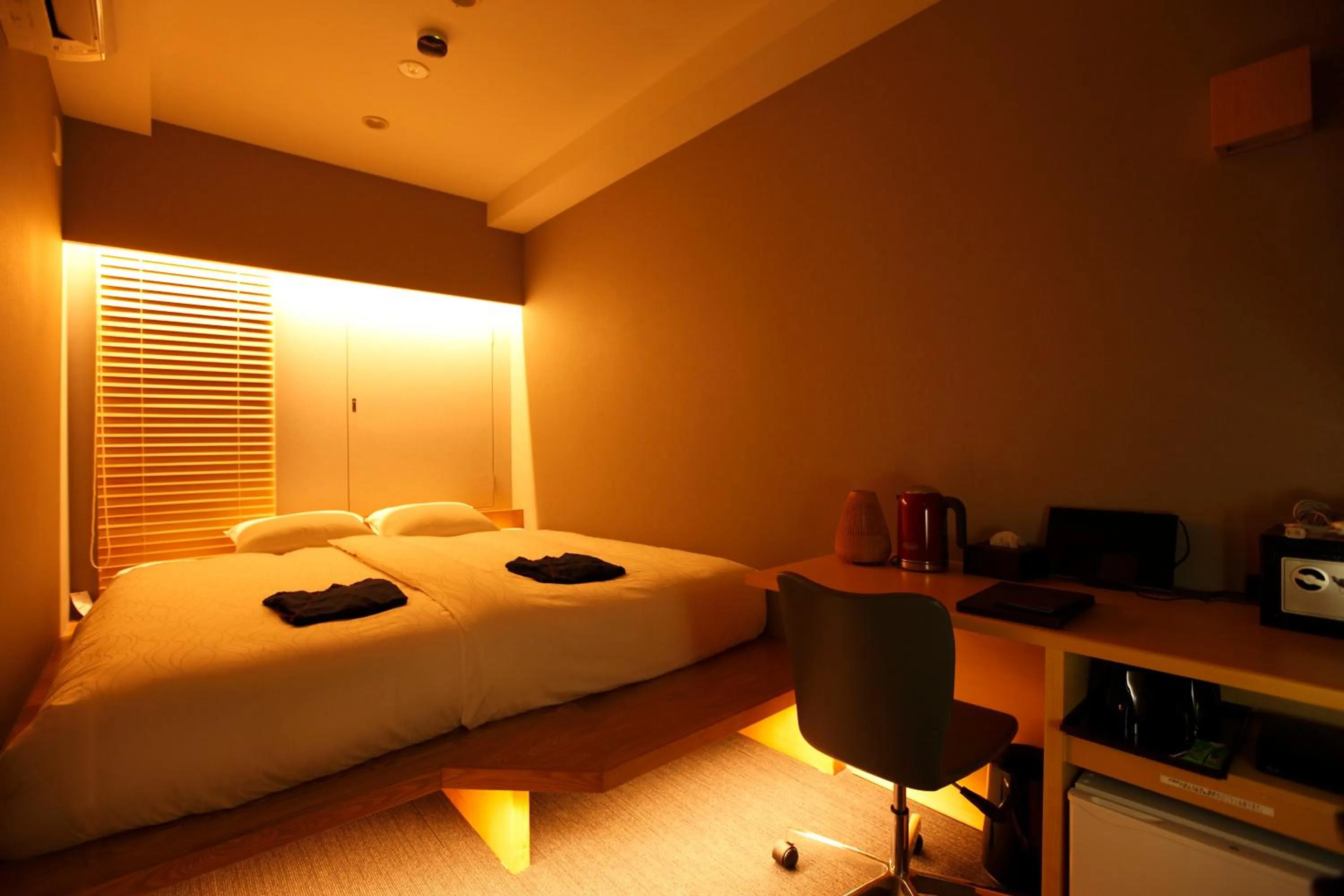 Photo of the whole room, Bed in HOTEL AMANEK Ginza East