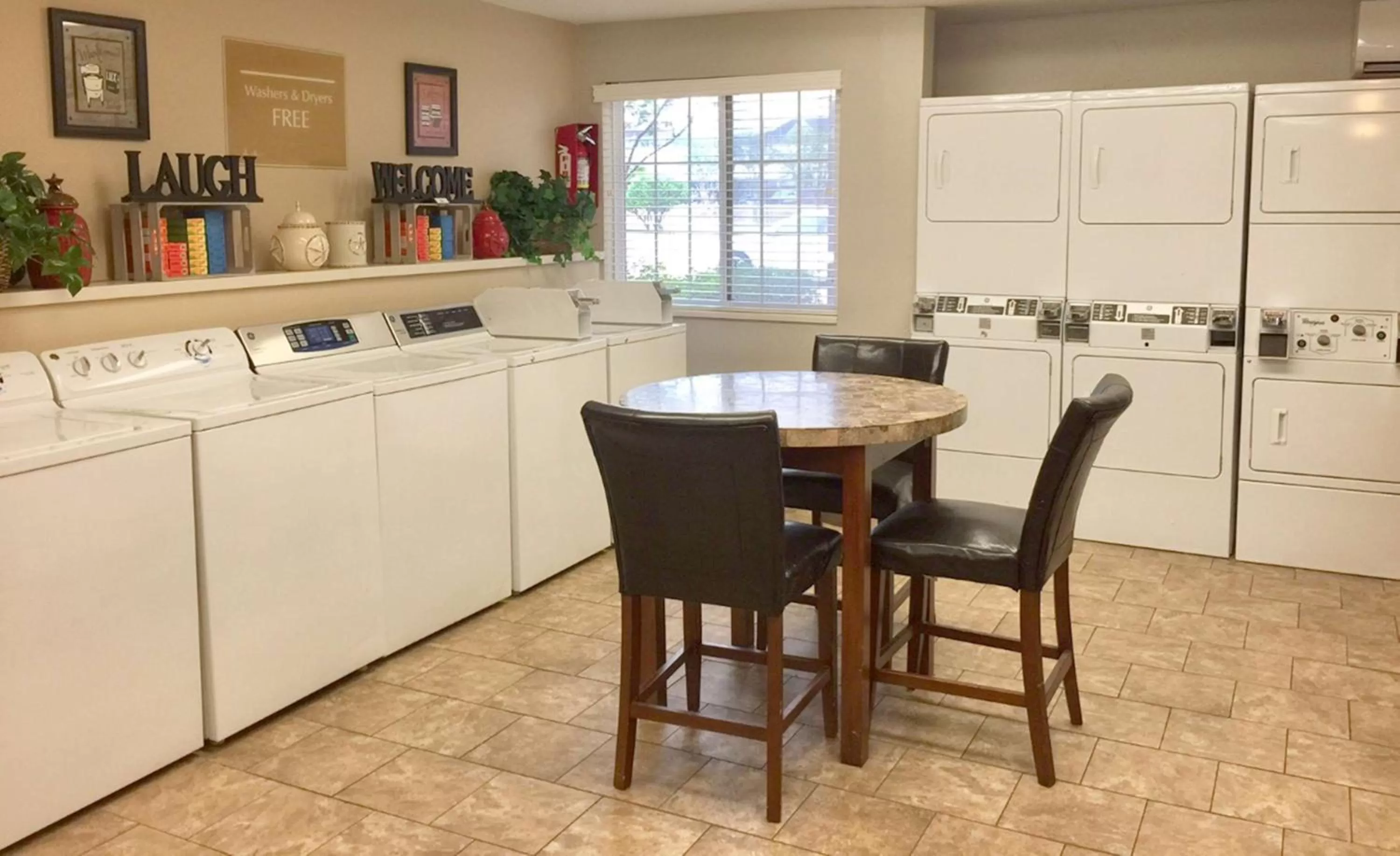 laundry, Kitchen/Kitchenette in Sonesta Simply Suites Houston W Beltway