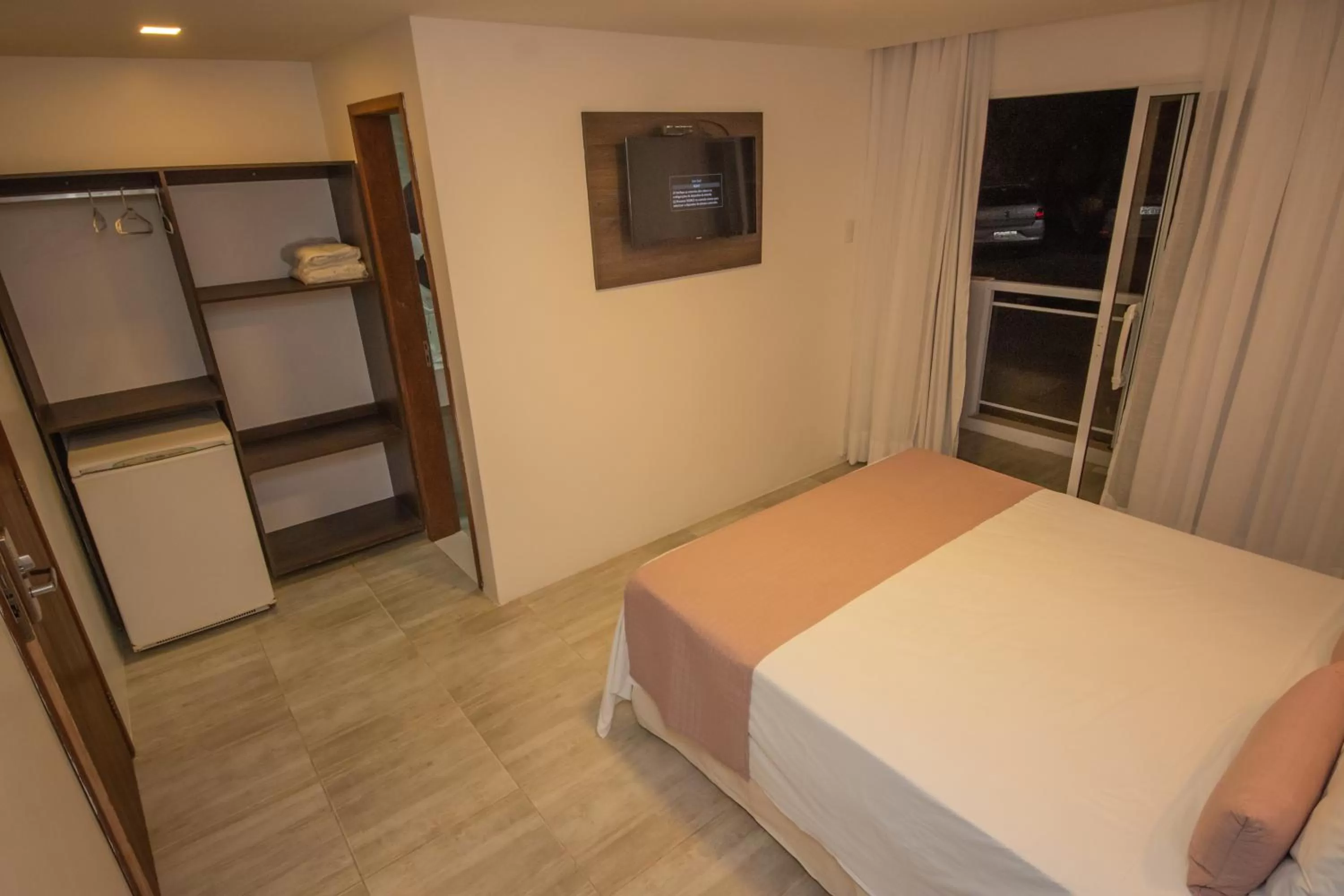 Bed in Pousada Sol e Mar