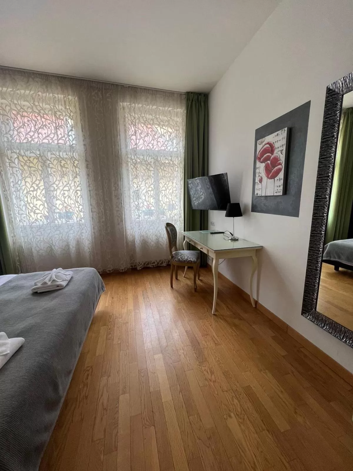 Bed in Dolce Vita Suites Boutique