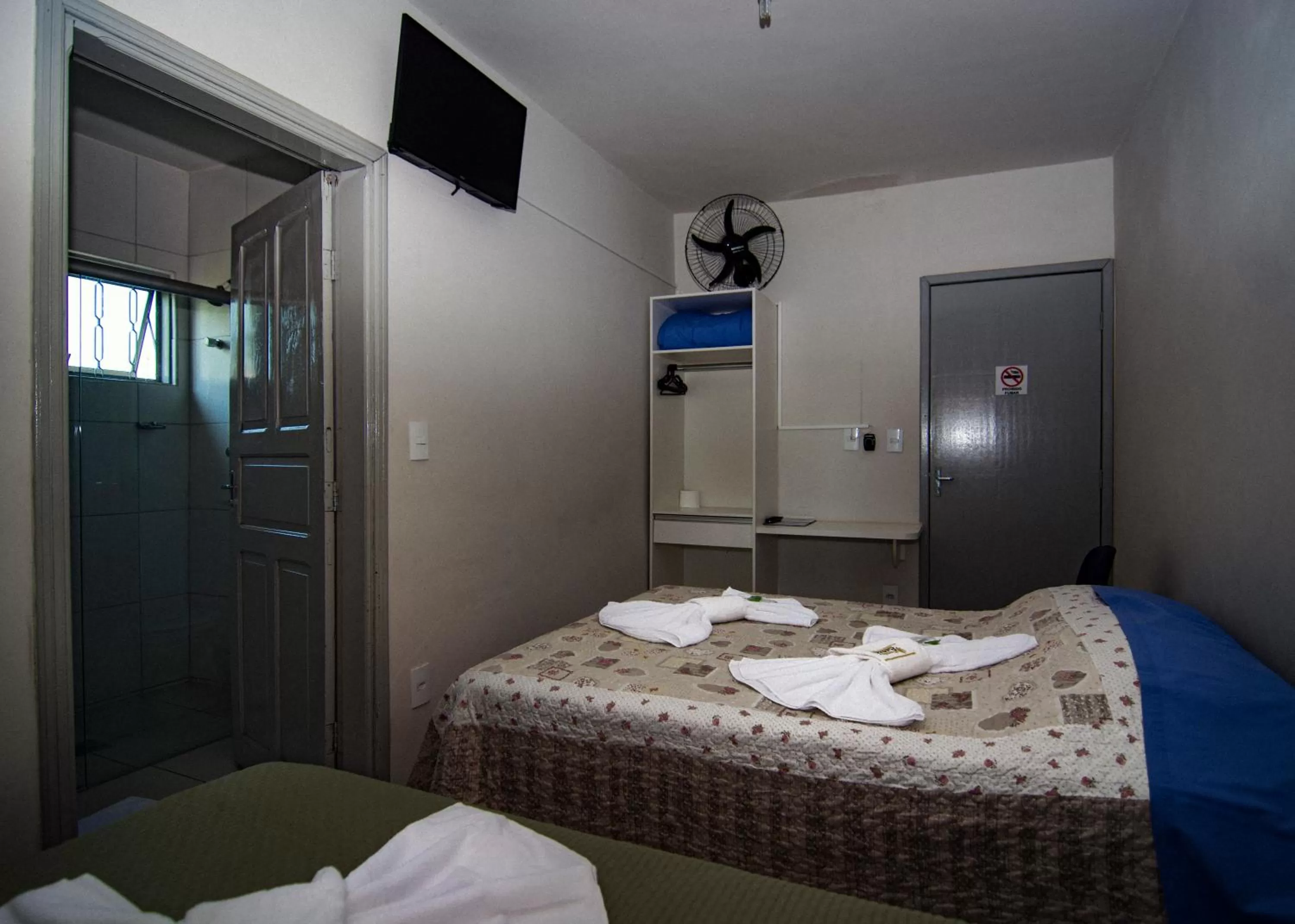 Bed in Pousada Araxá