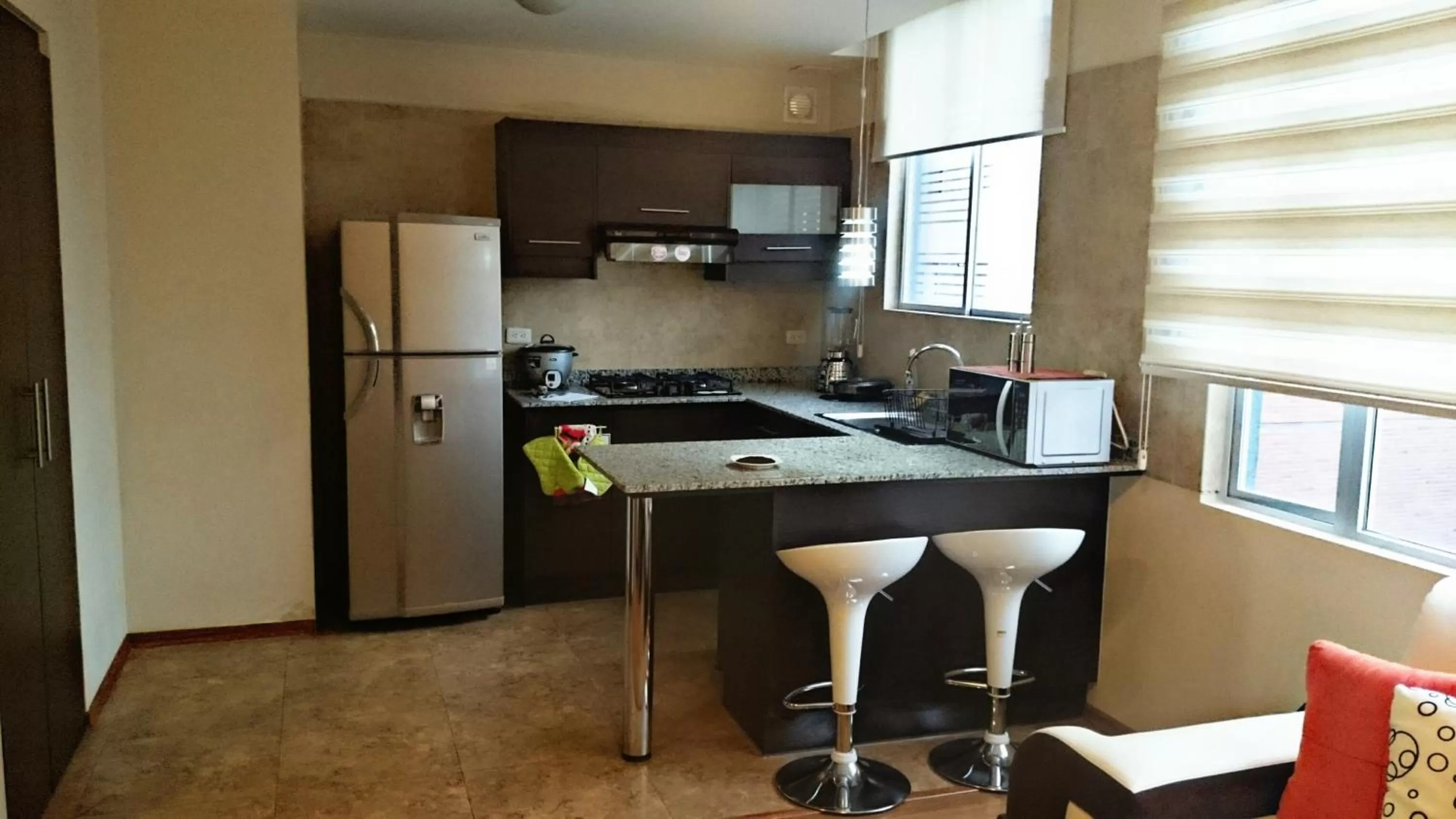 Kitchen or kitchenette in Misuitehotel La Carolina Quito