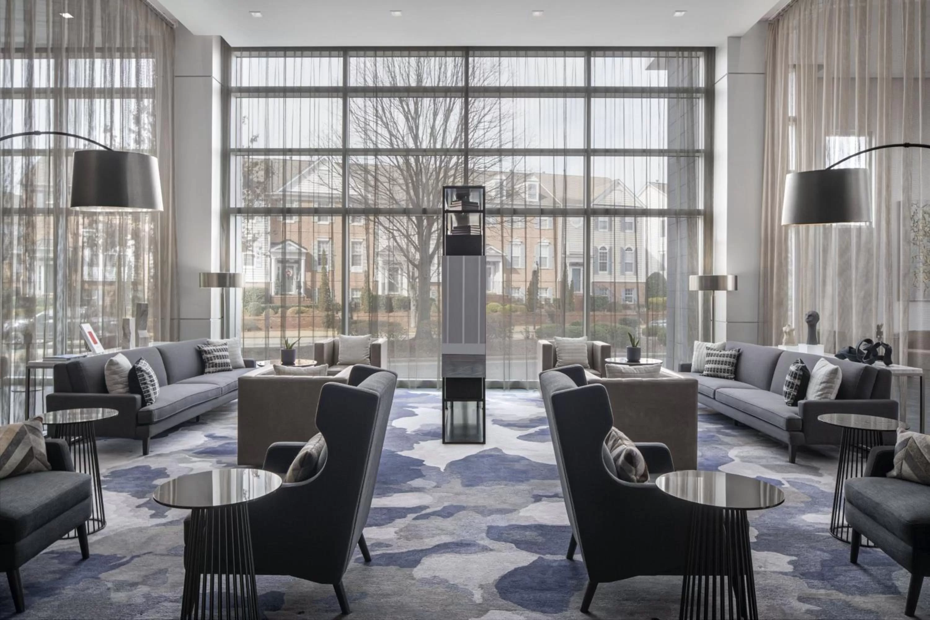 Lobby or reception in AC Hotel by Marriott Charlotte Ballantyne