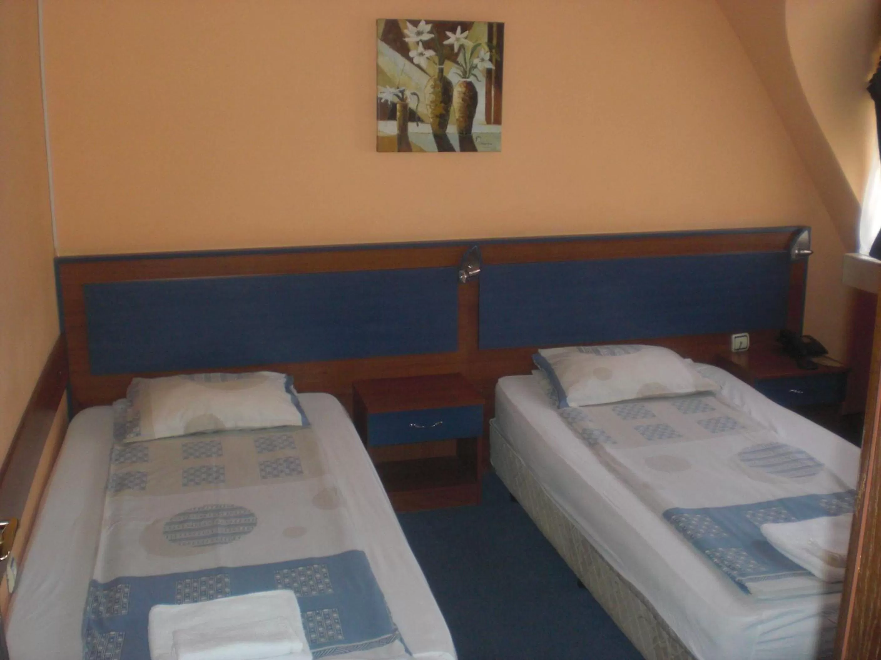 Bed in Fenix Family Hotel