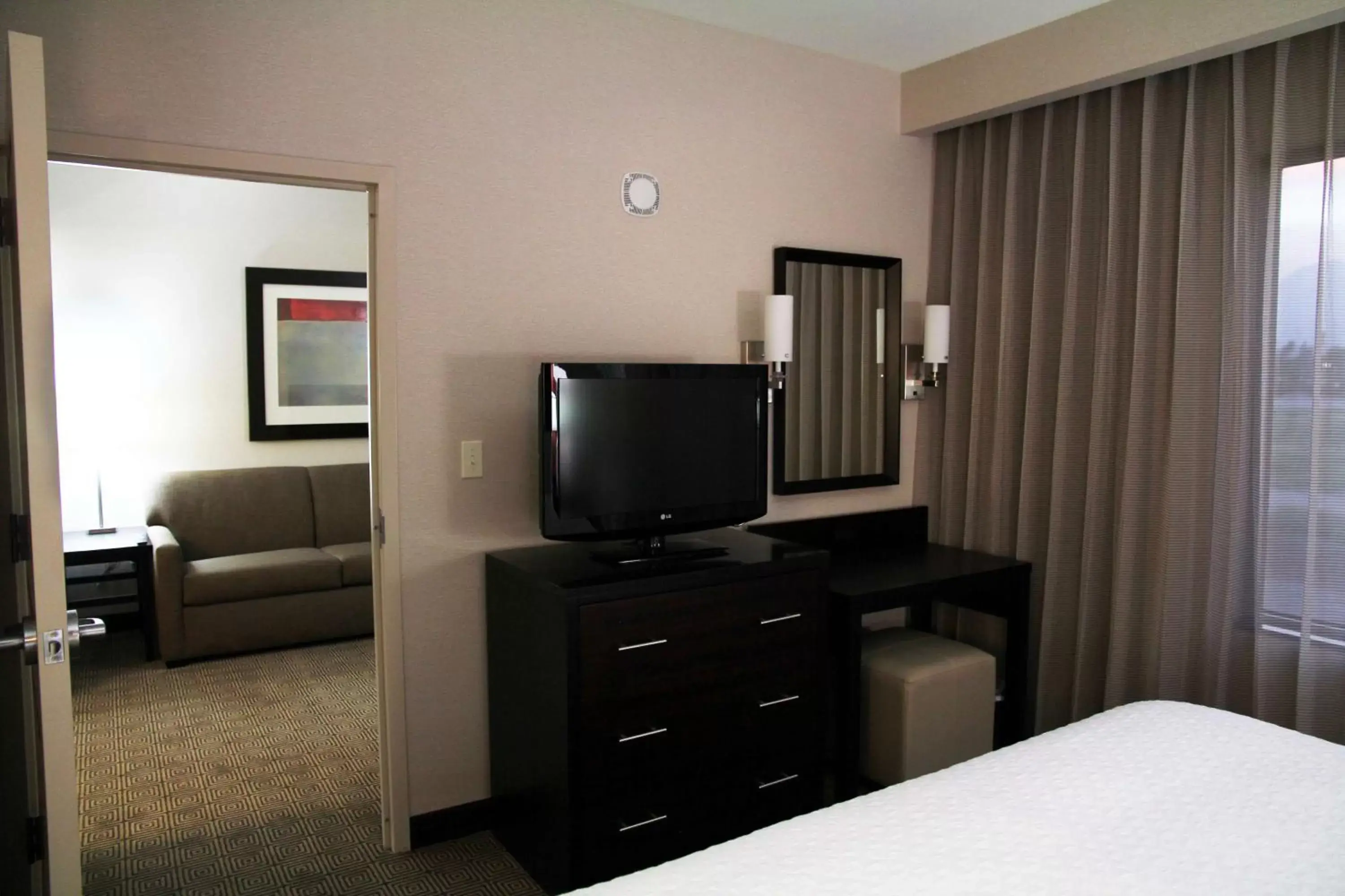 One-Bedroom King Suite with Roll-in Shower - Mobility Accessible in Embassy Suites Ontario - Airport One-Bedroom King Suite with Roll-in Shower - Mobility Accessible in Embassy Suites Ontario - Airport