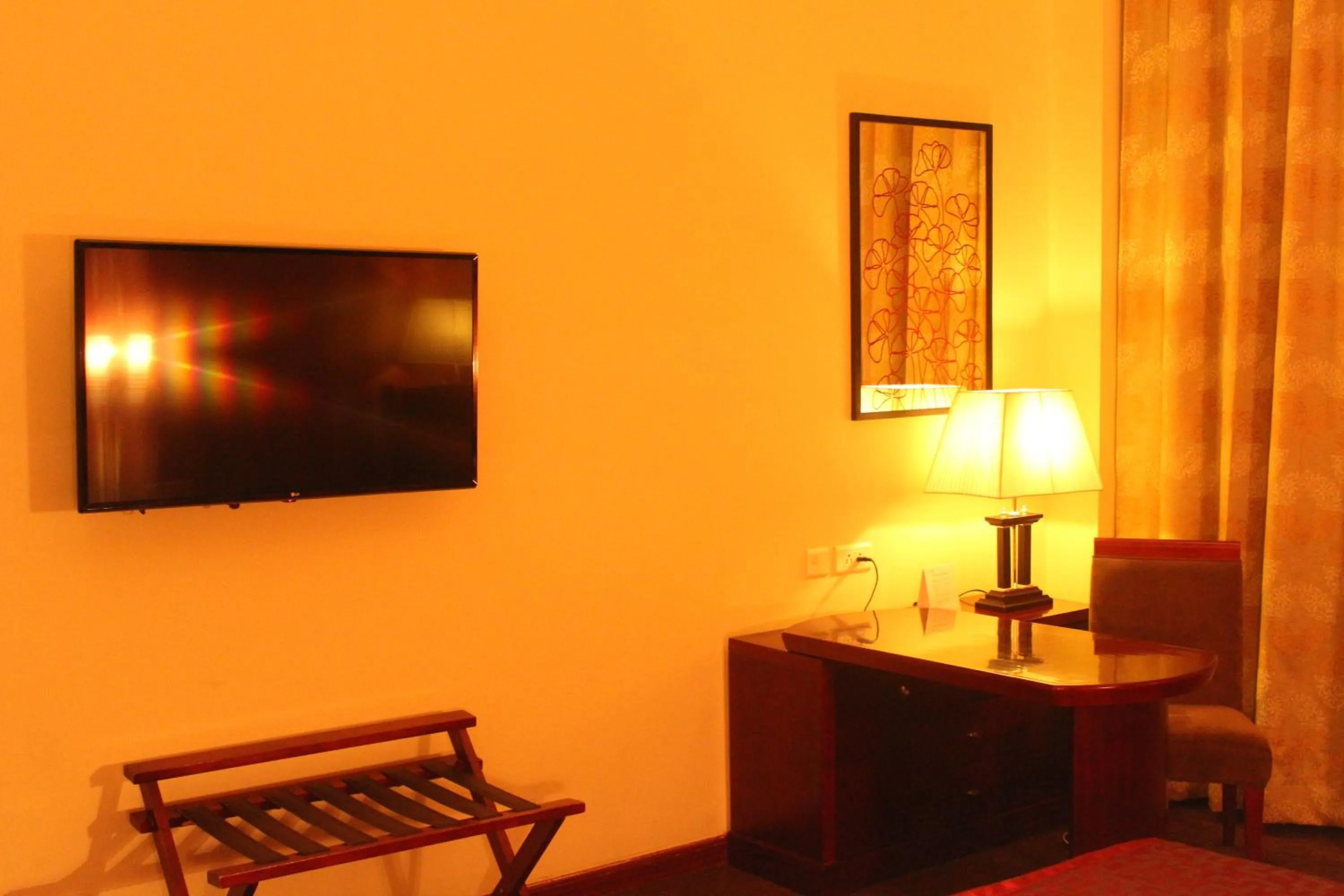 TV and multimedia in Ramada by Wyndham Jaipur Jaisinghpura