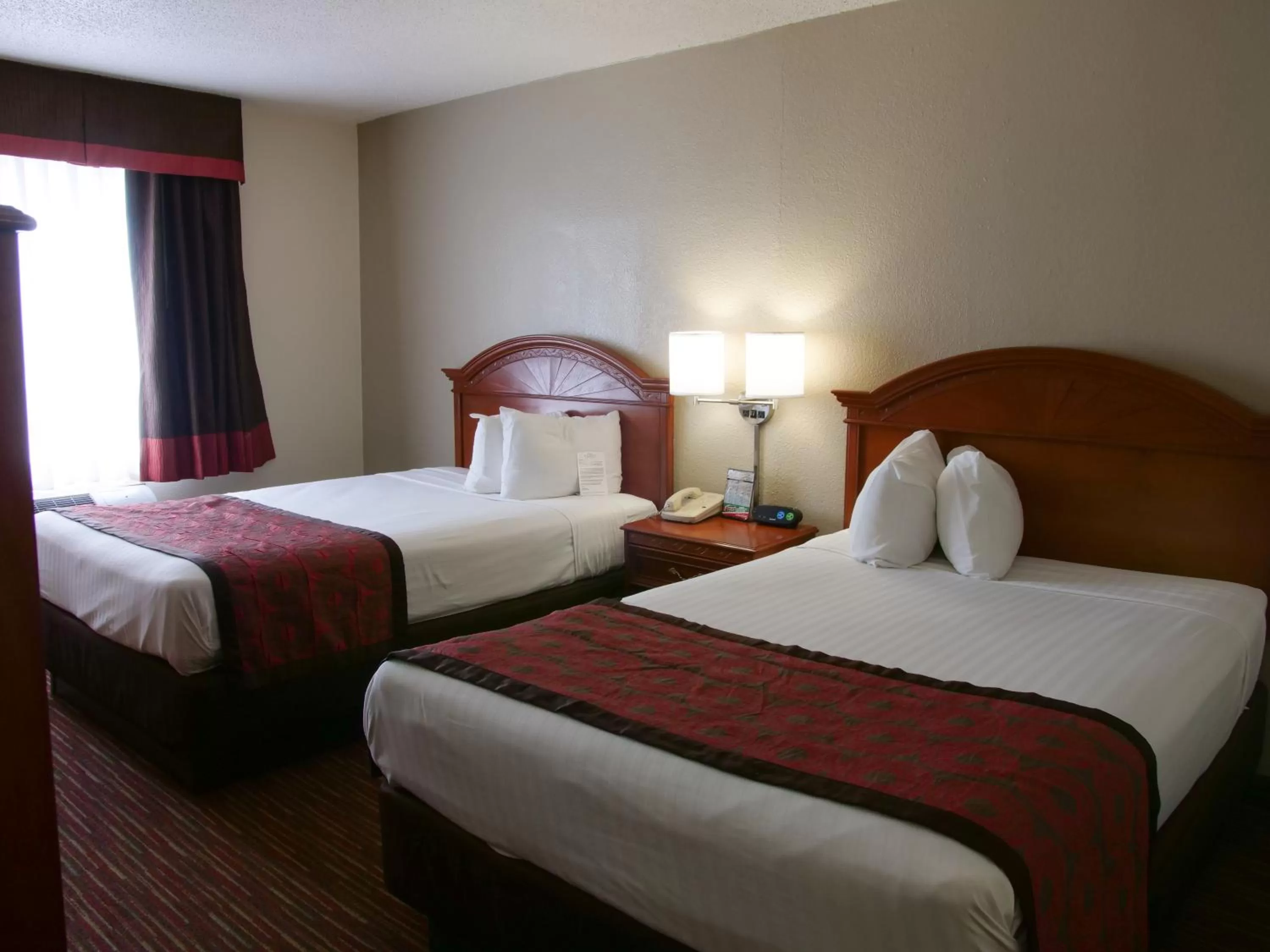 Photo of the whole room, Bed in Baymont by Wyndham Louisville East