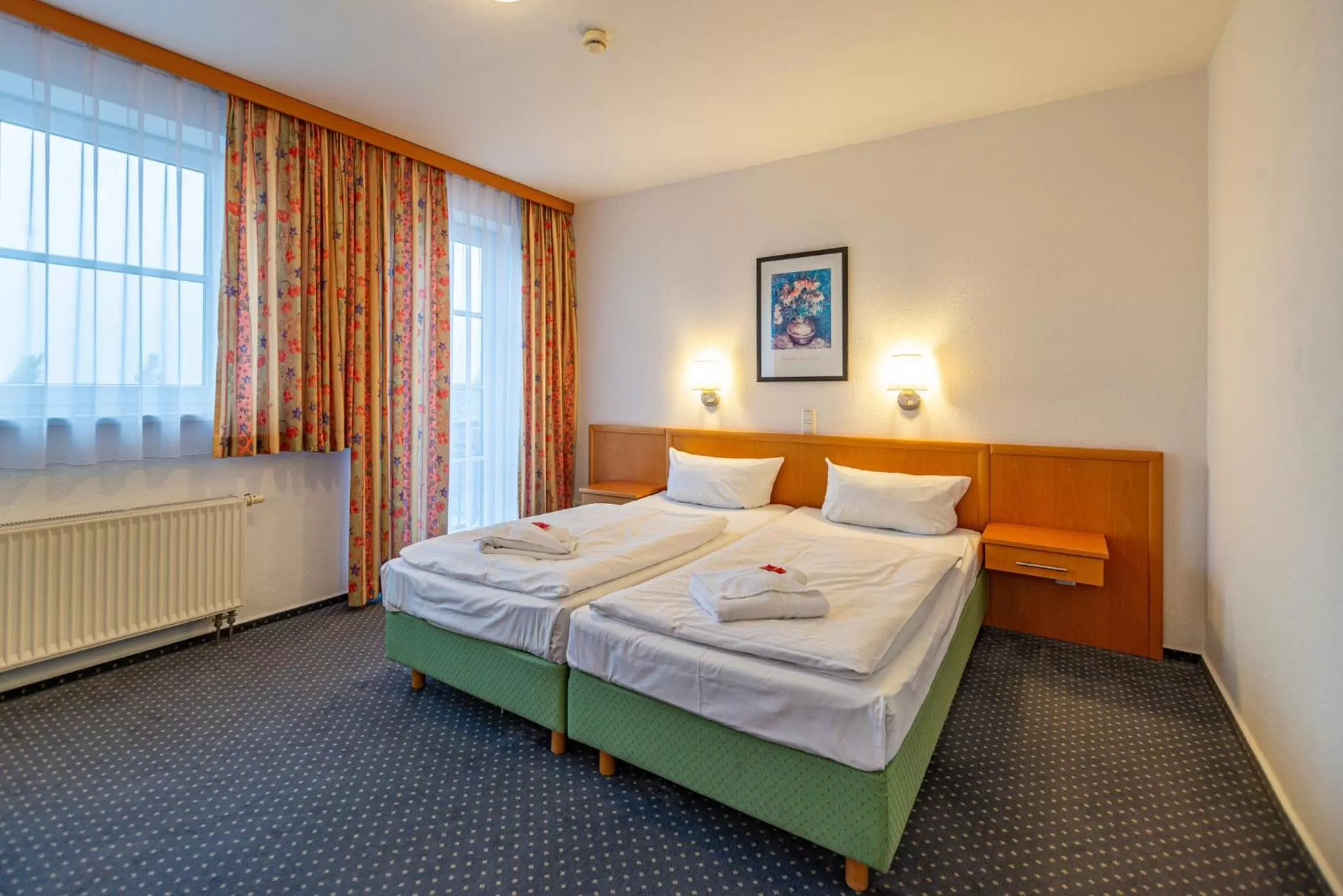 Photo of the whole room, Bed in Hotel Rostock West im "Kritzmow Park"
