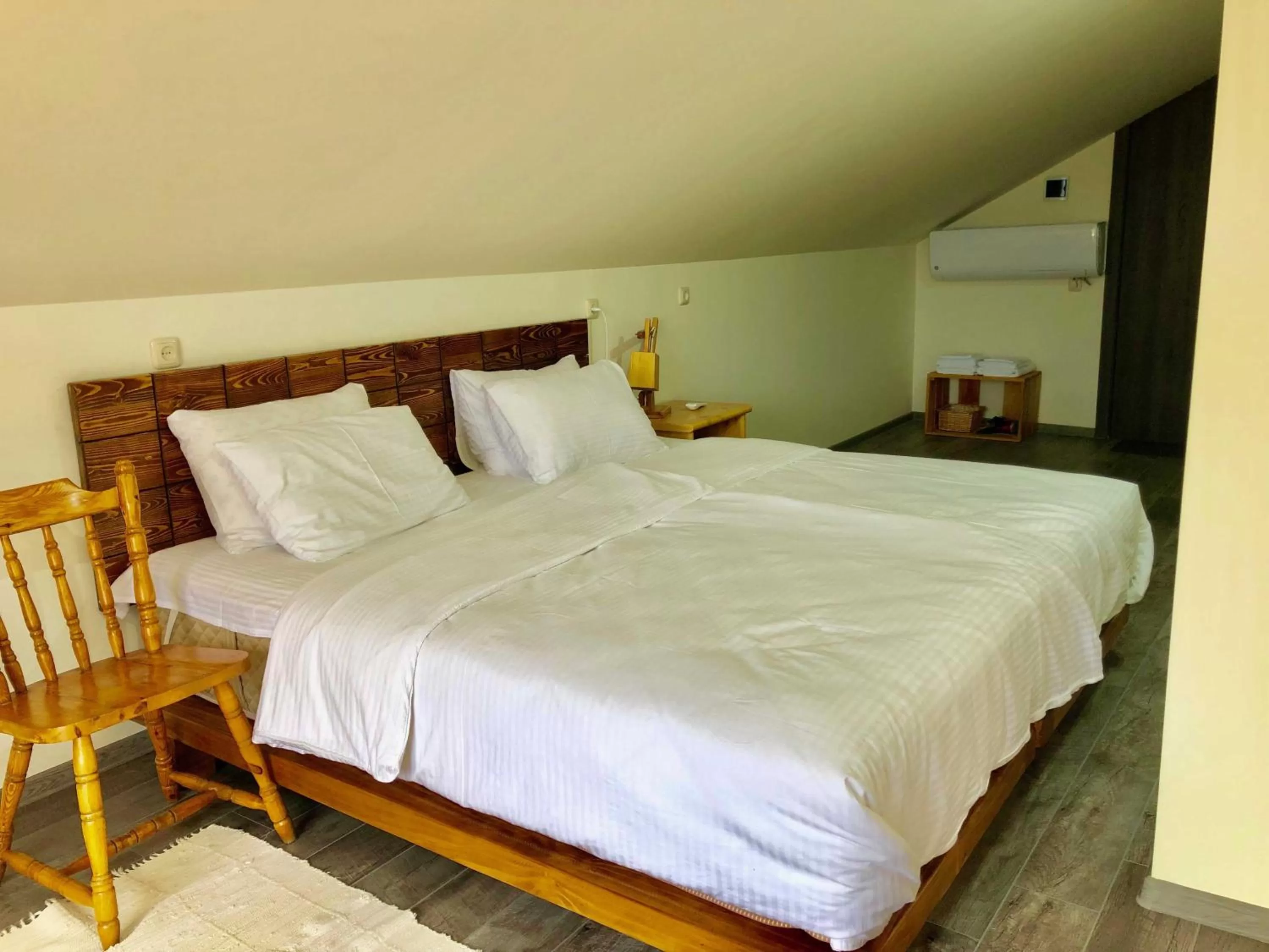 Bed in Green Stone Boutique Hotel