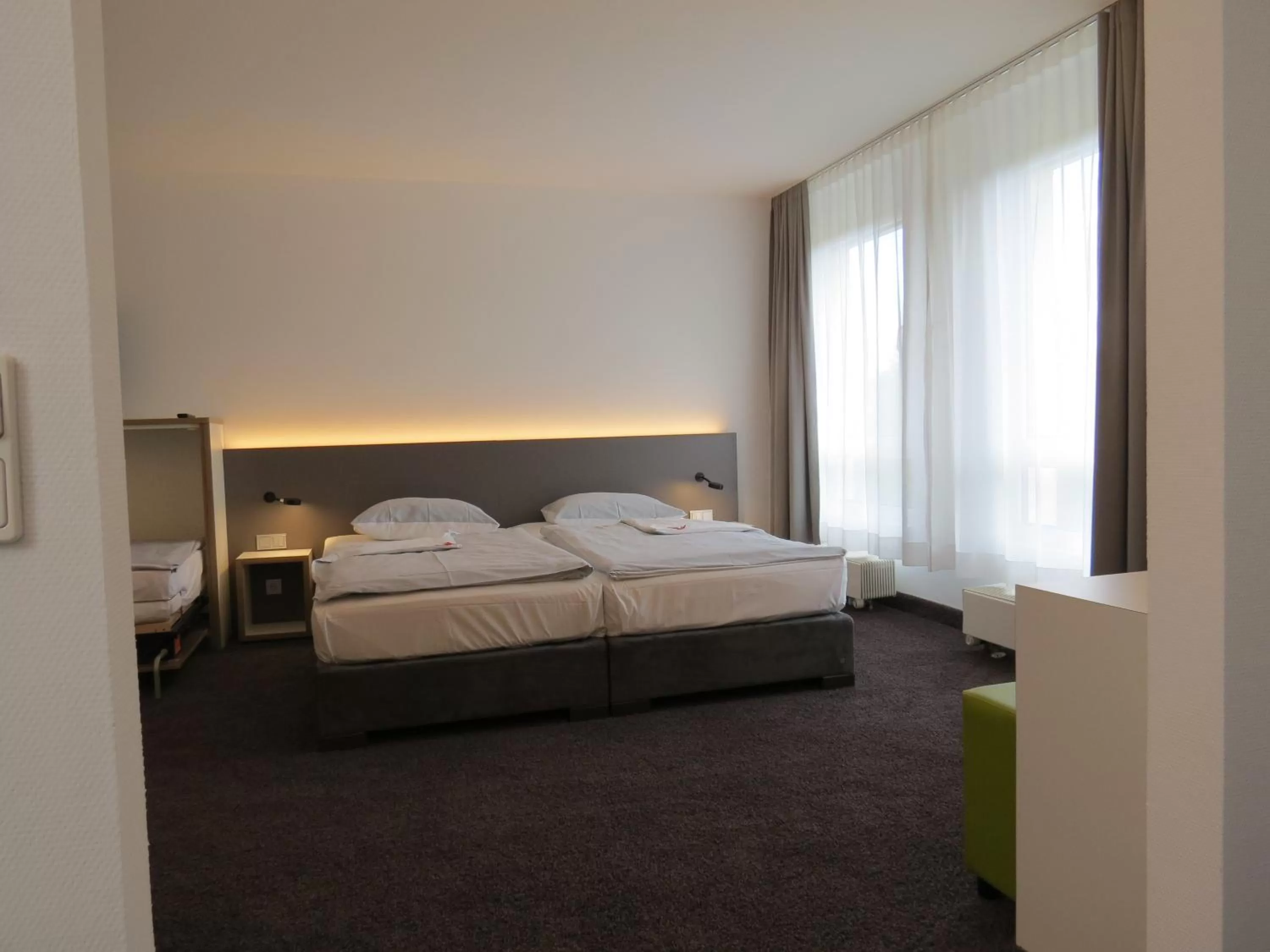 Bed in Comfor Hotel Ulm City