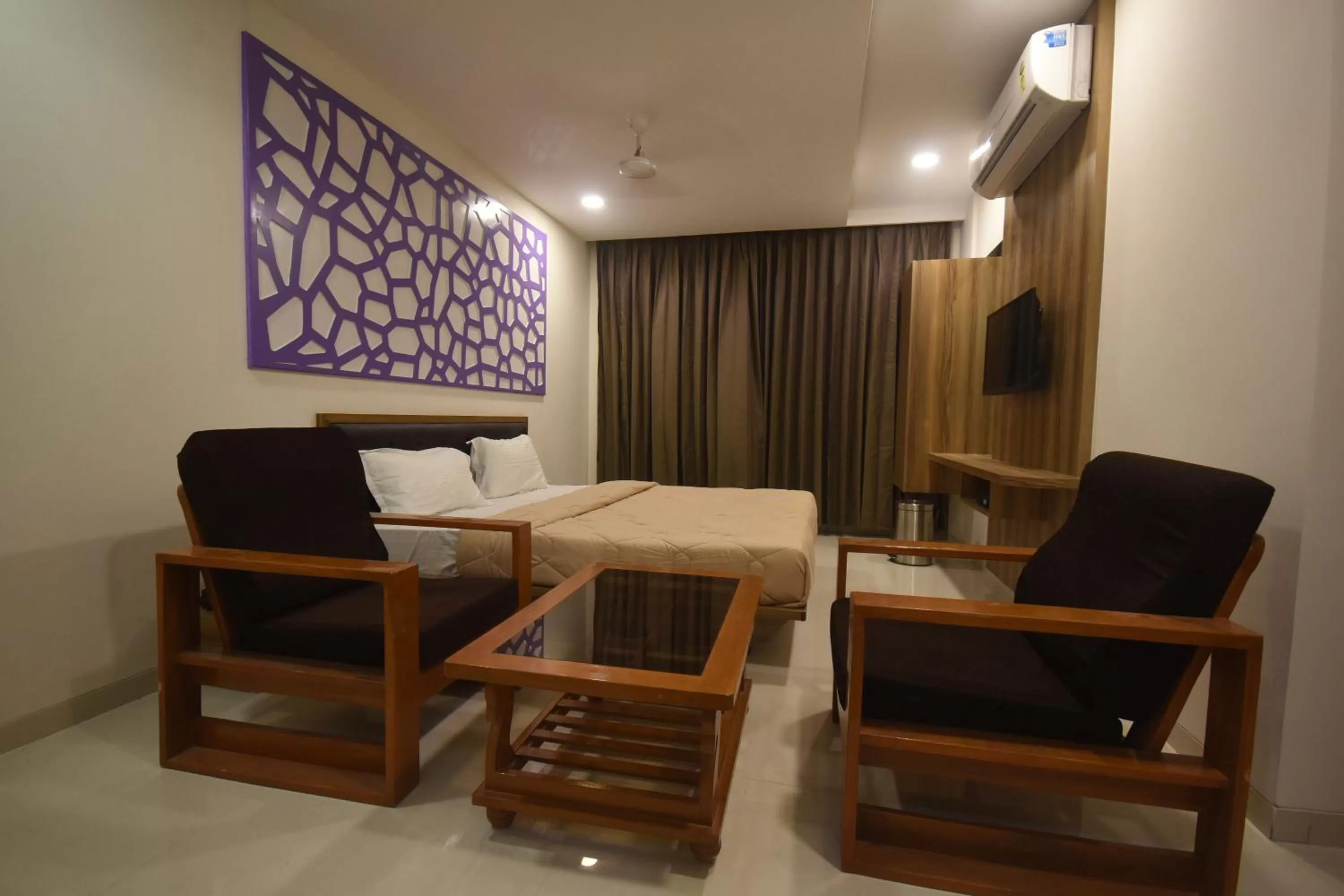 Bed, Seating Area in The Pacific Hotel