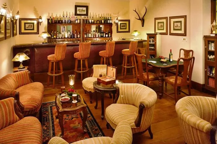 Lounge or bar in The Elgin Silver Oaks - Heritage Resort & Spa