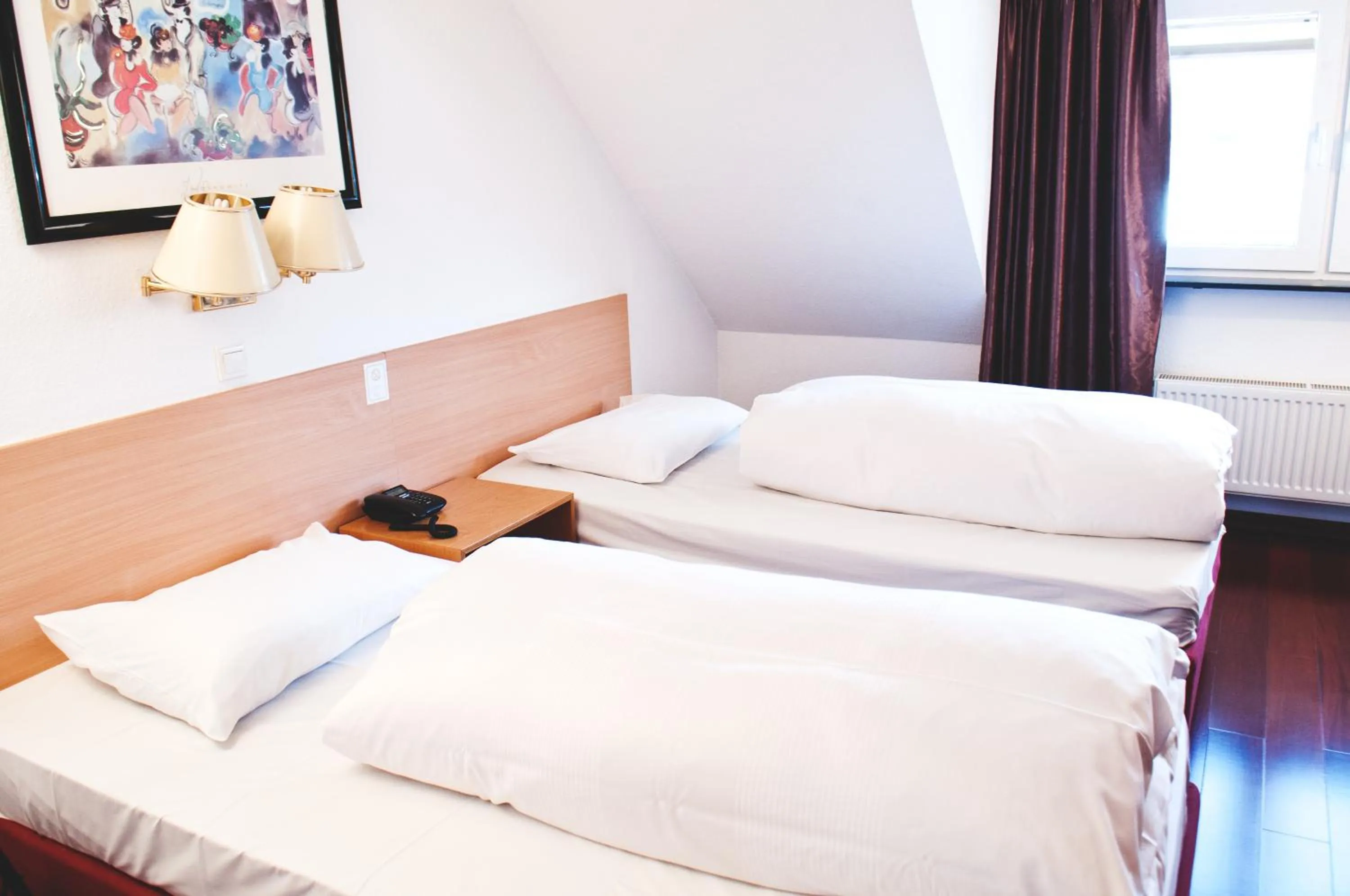 Bed in Hotel Batavia