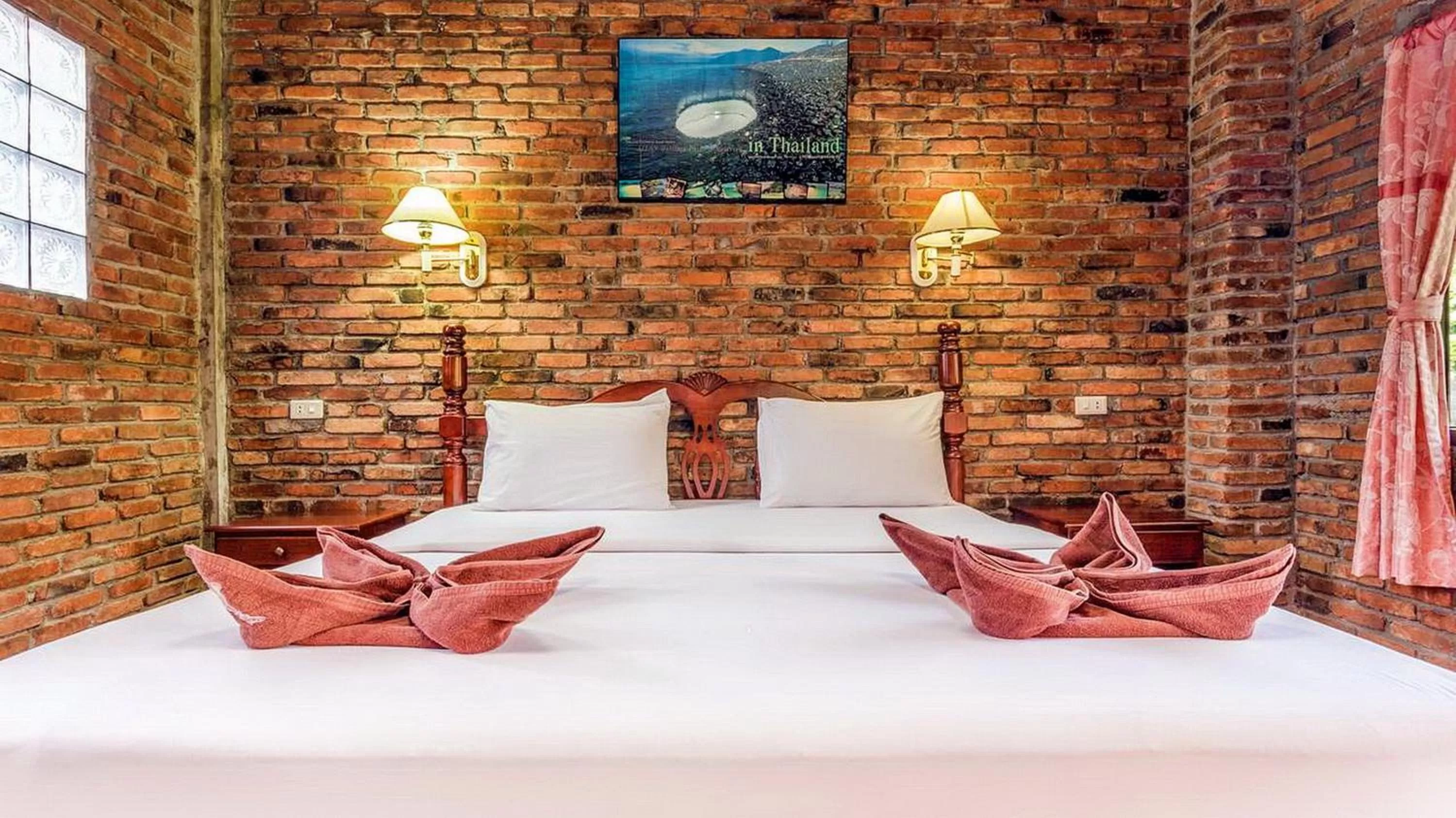 Bed in Doo Dee Boutique Resort by Swiss Chalet