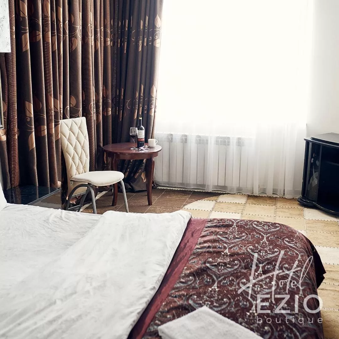 Bed in Hotel EZIO