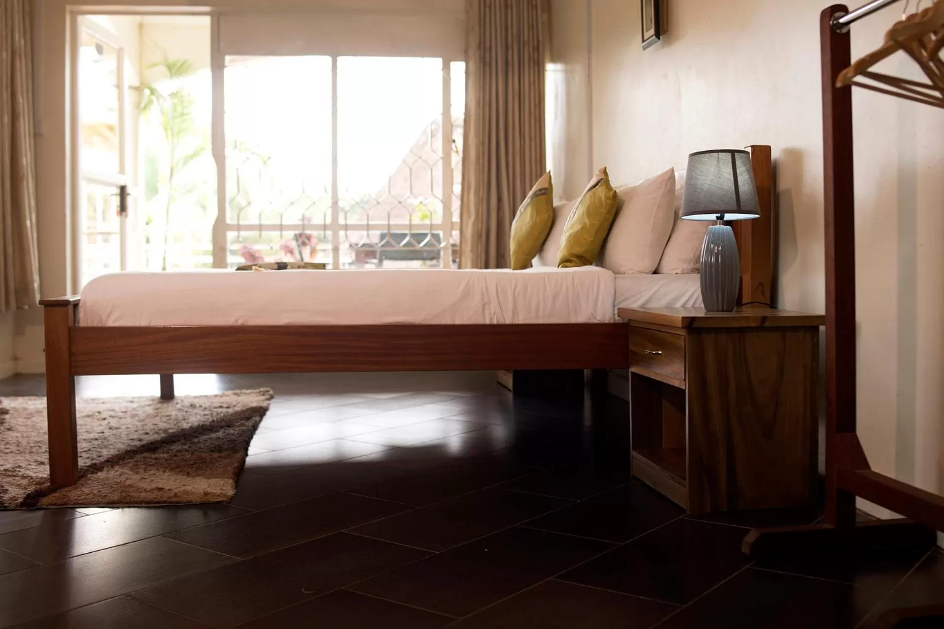 Bed in Entebbe Palm Hotel