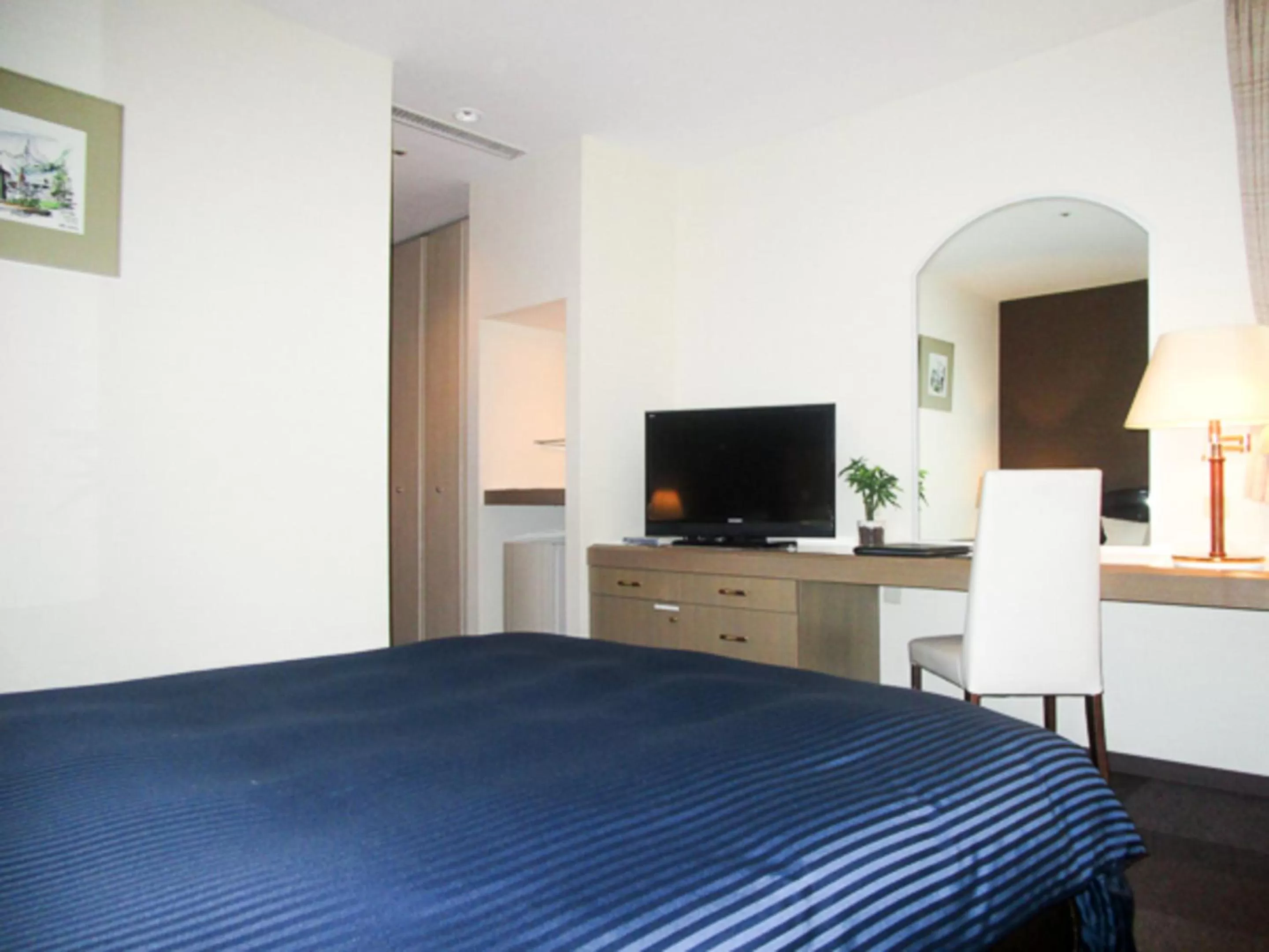 Photo of the whole room, Bed in HOTEL LiVEMAX BUDGET SAPPORO