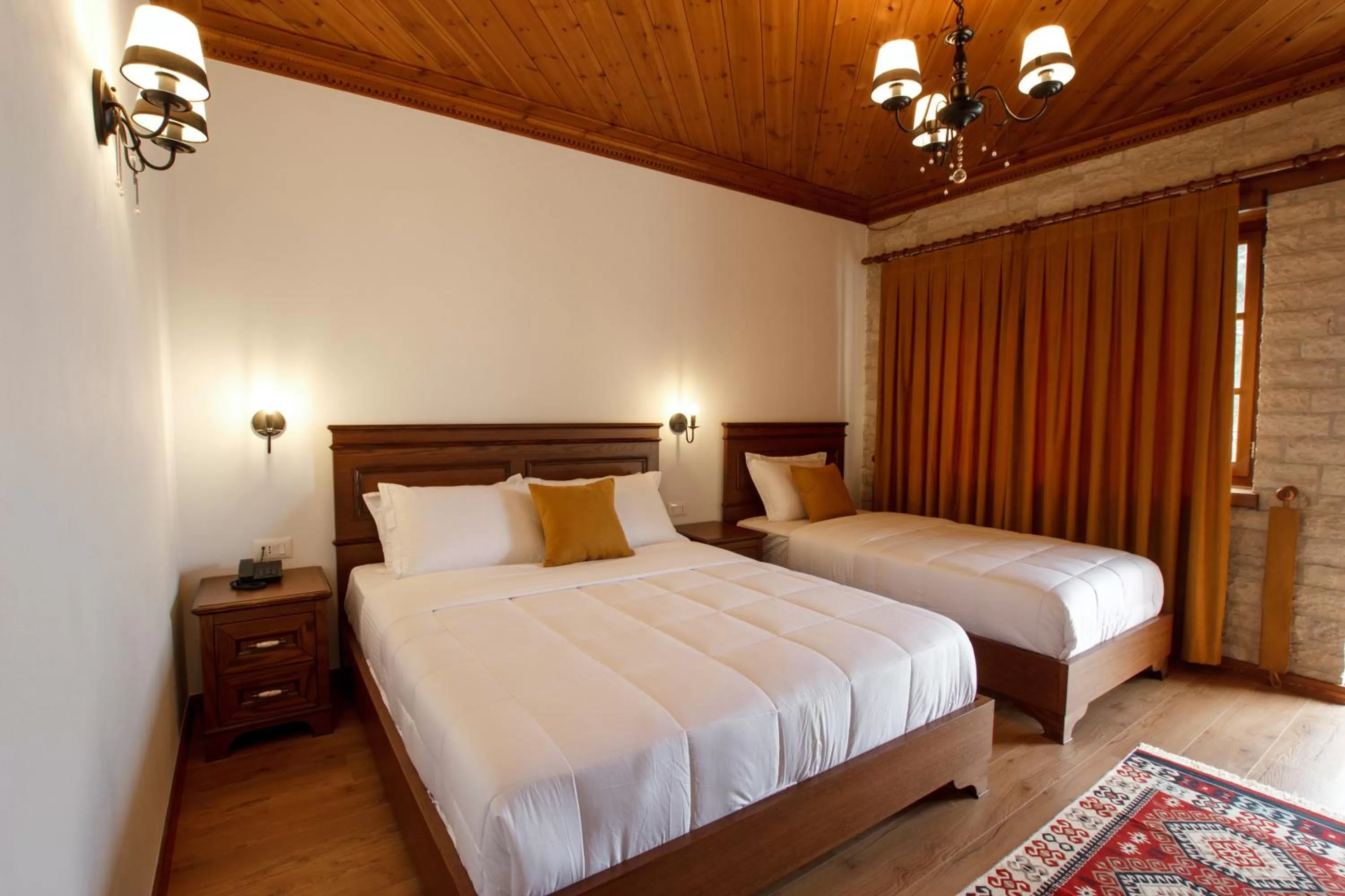 Bedroom, Bed in Rose Garden Hotel