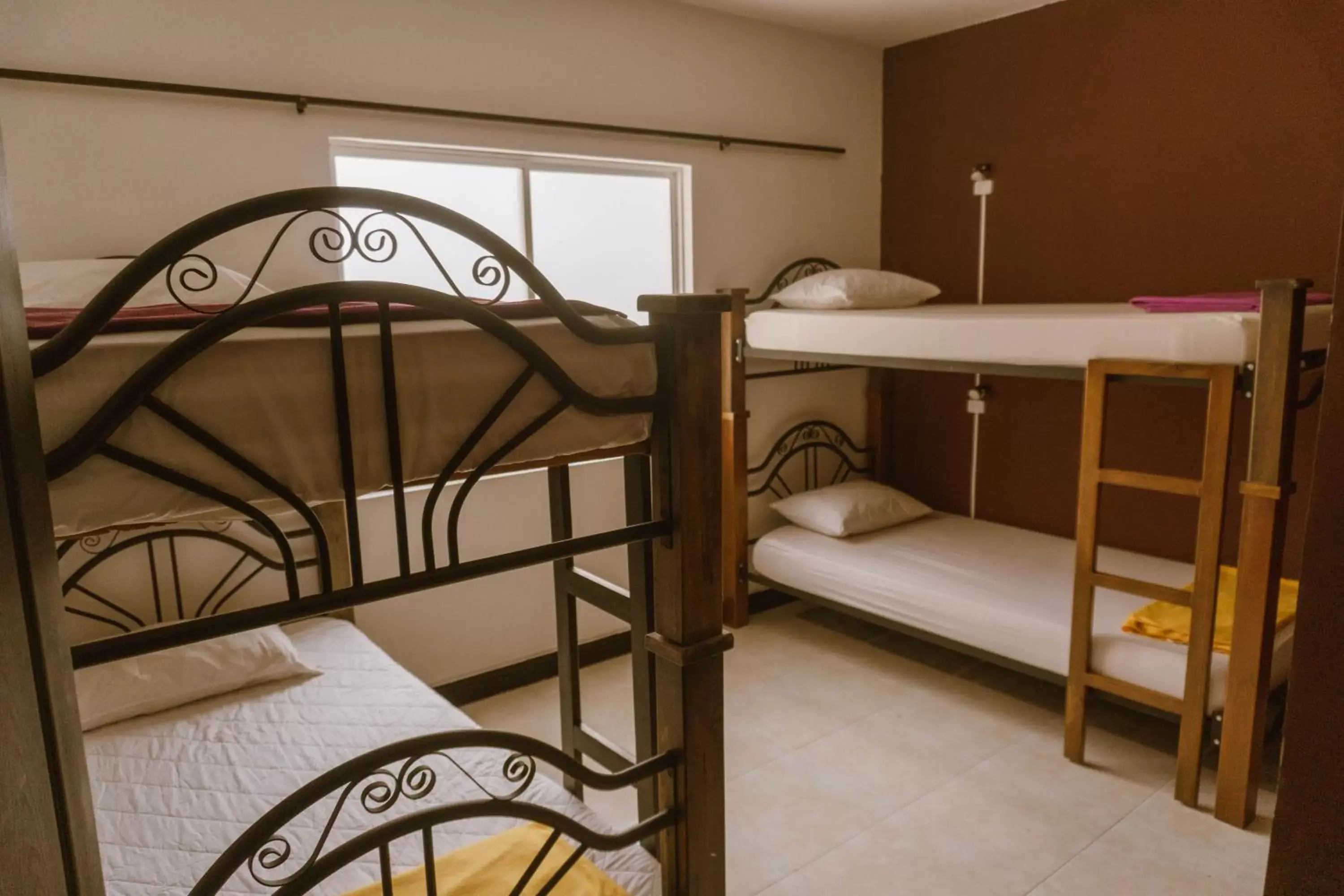 Bed in 4-Bed Female Dormitory Room in Tuki Hostel & Lounge Bed in 4-Bed Female Dormitory Room in Tuki Hostel & Lounge