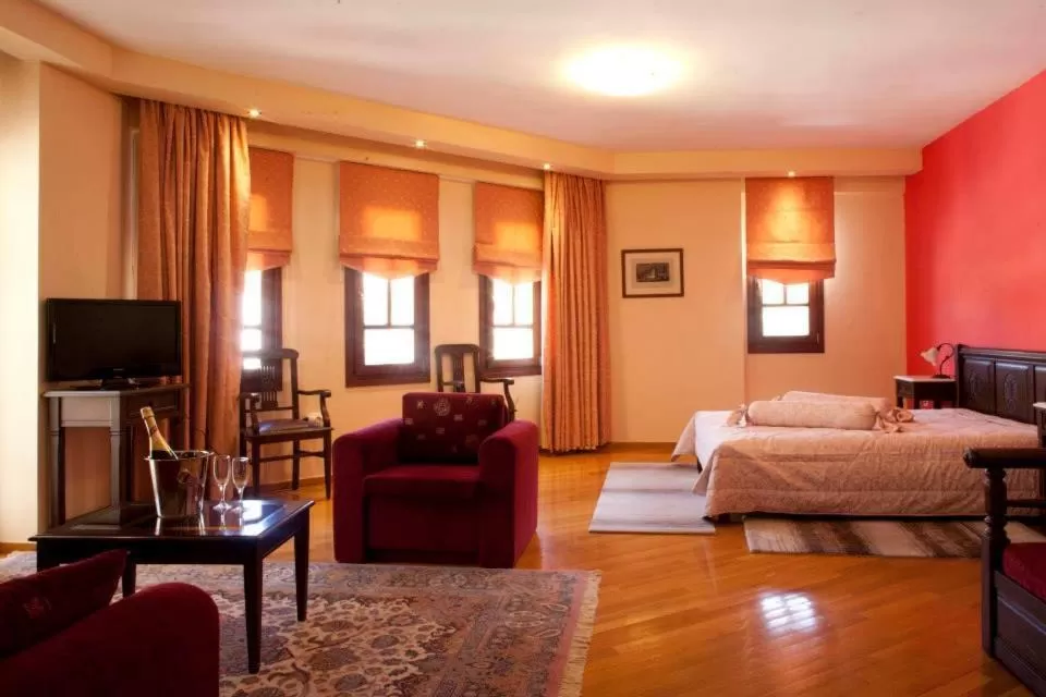 Bed, Seating Area in Hotel Kynaitha