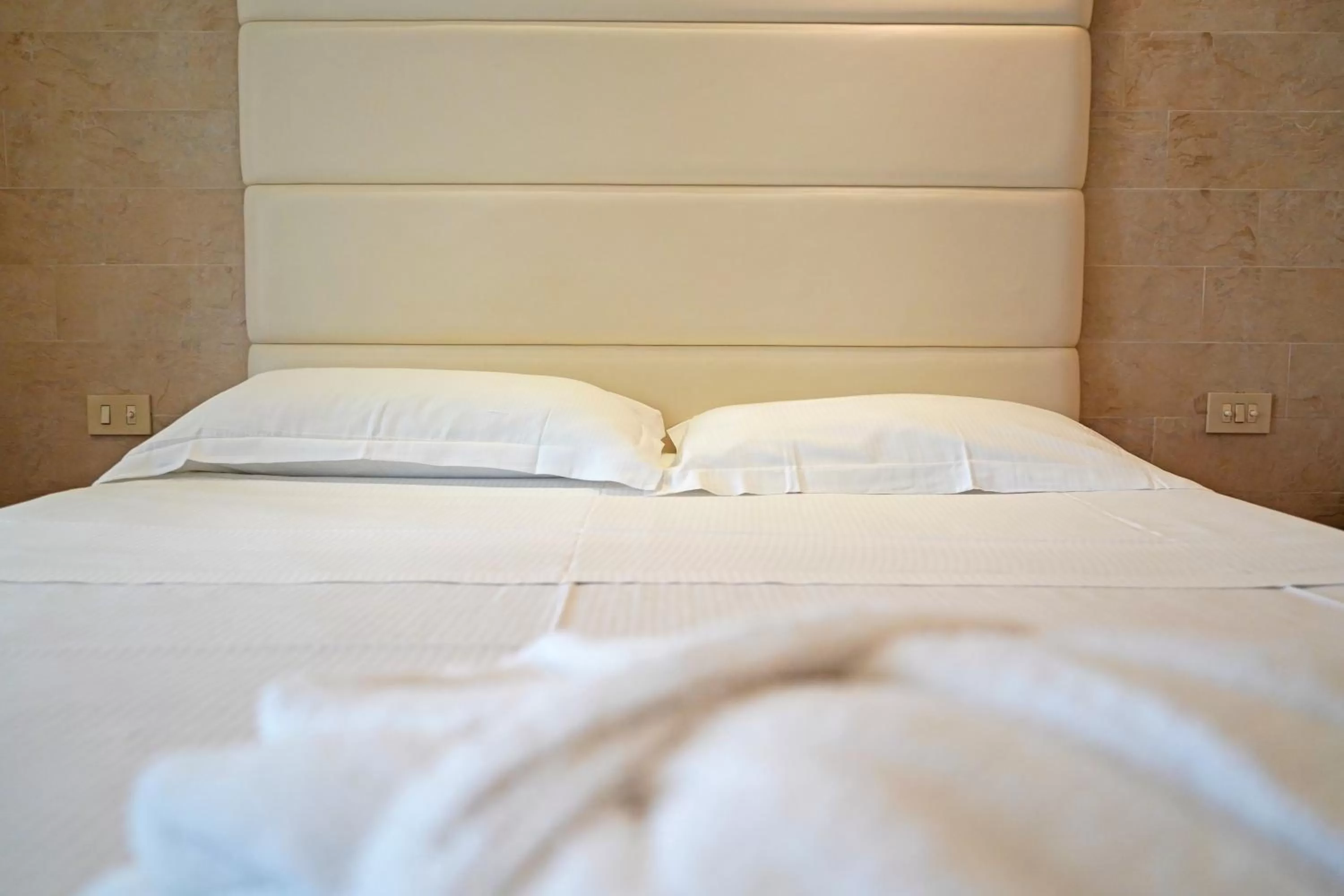 Bed in AmbientHotels Panoramic