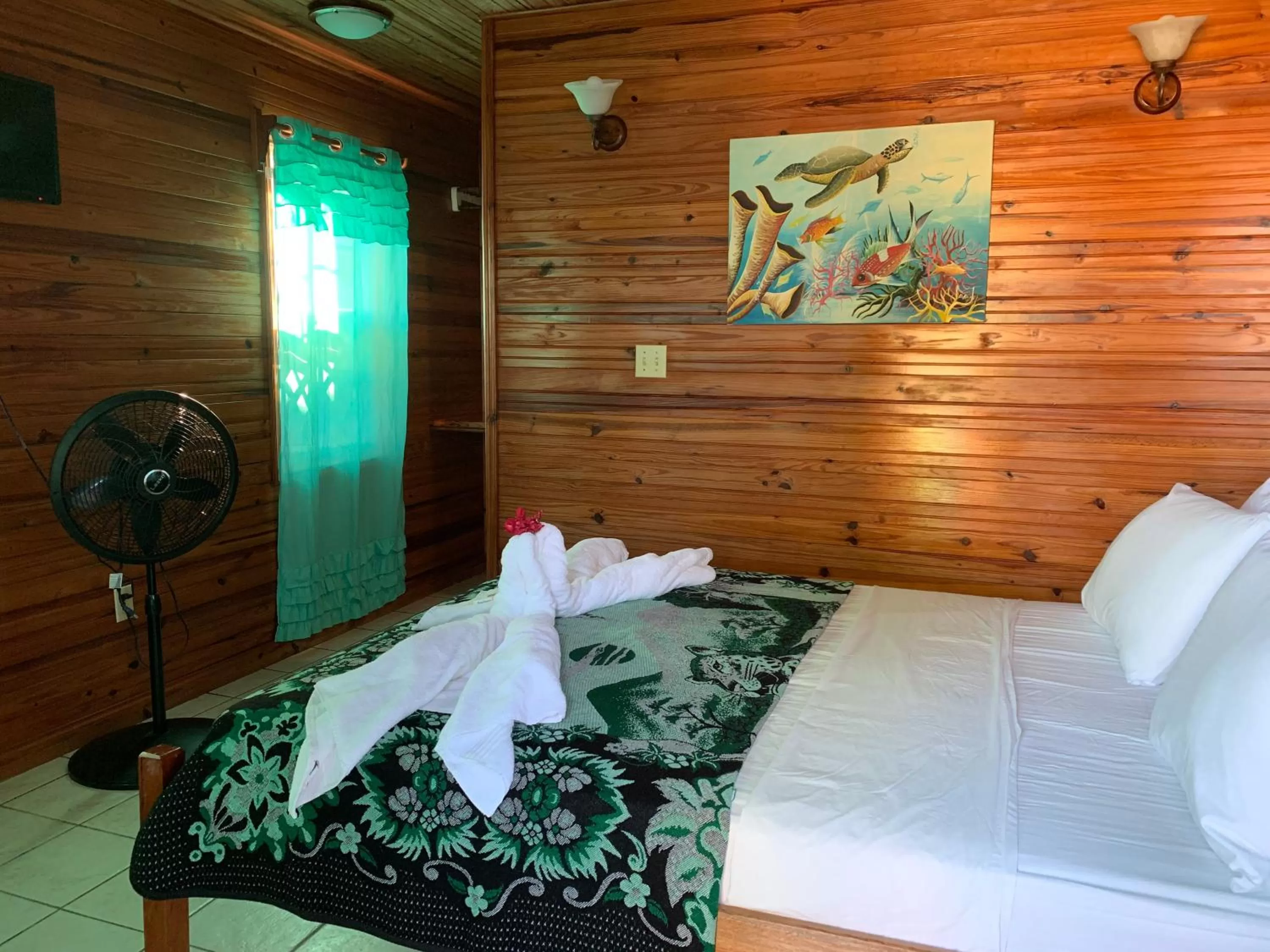 Bed in Blue Wave Guest House