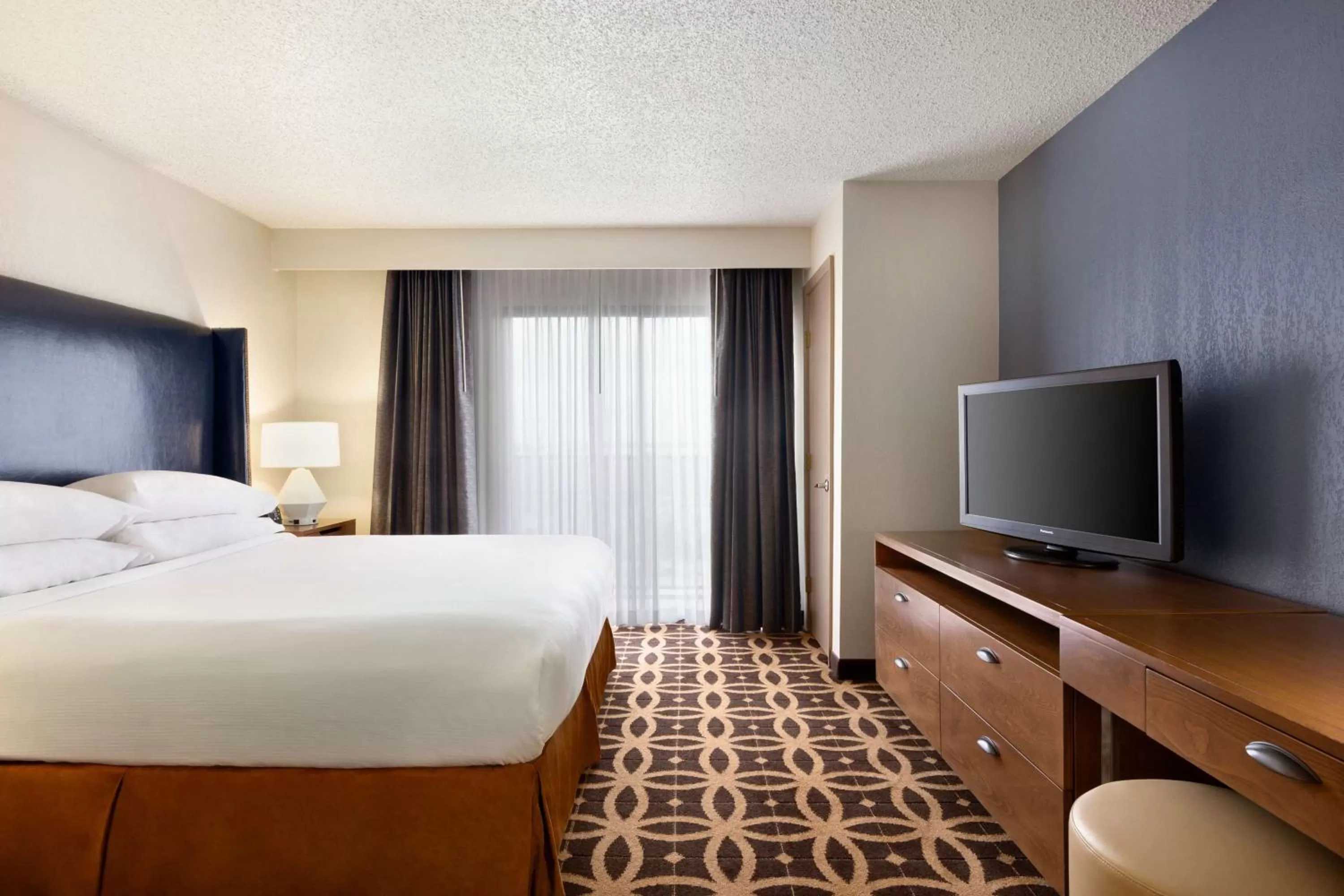 Bed in Embassy Suites by Hilton Dallas DFW Airport South