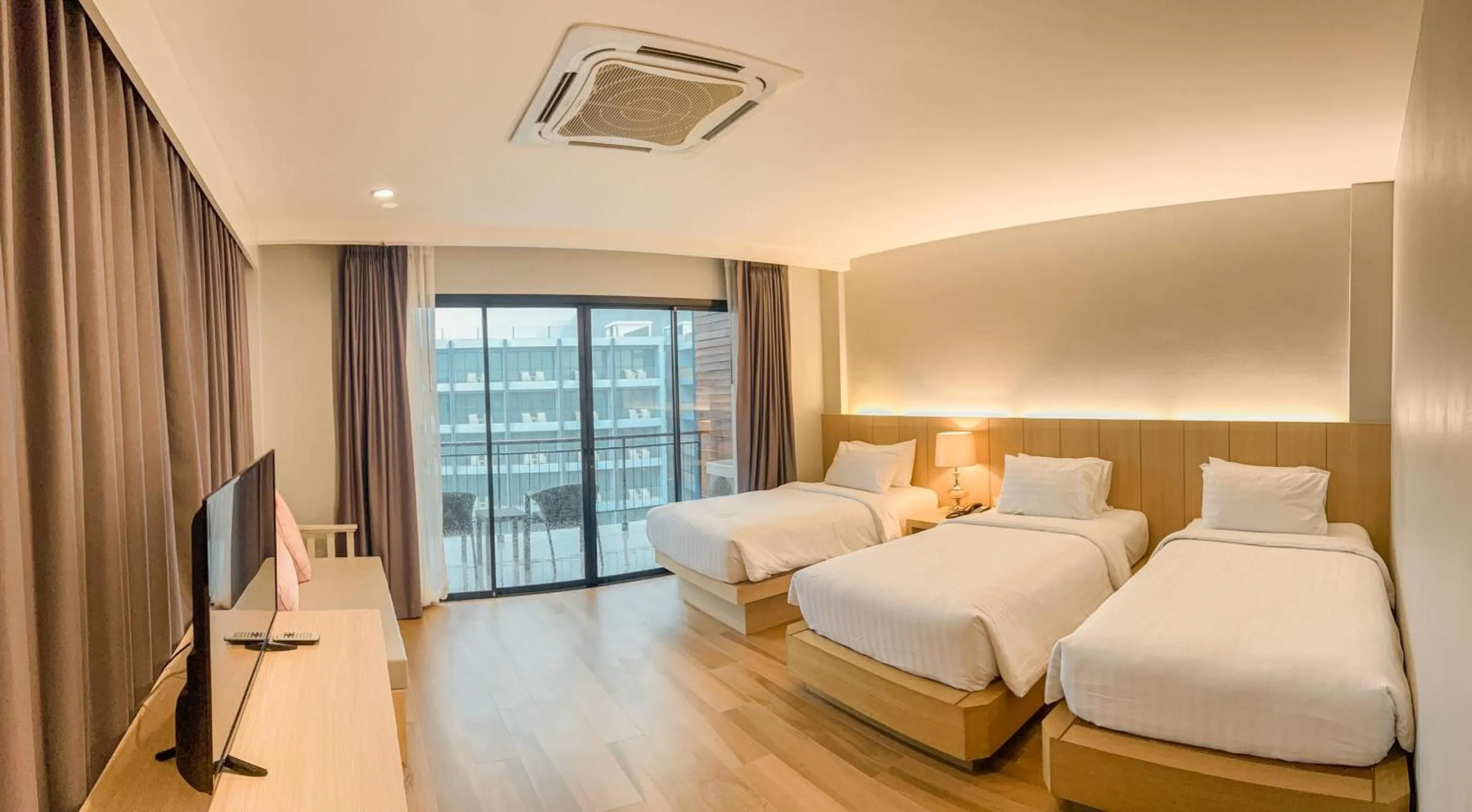 Photo of the whole room, Bed in AVA SEA Resort Krabi, Ao Nang Beach