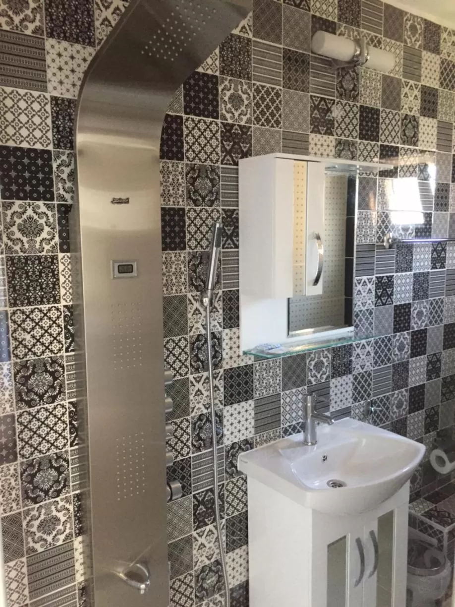 Bathroom in Family Hotel Malibu