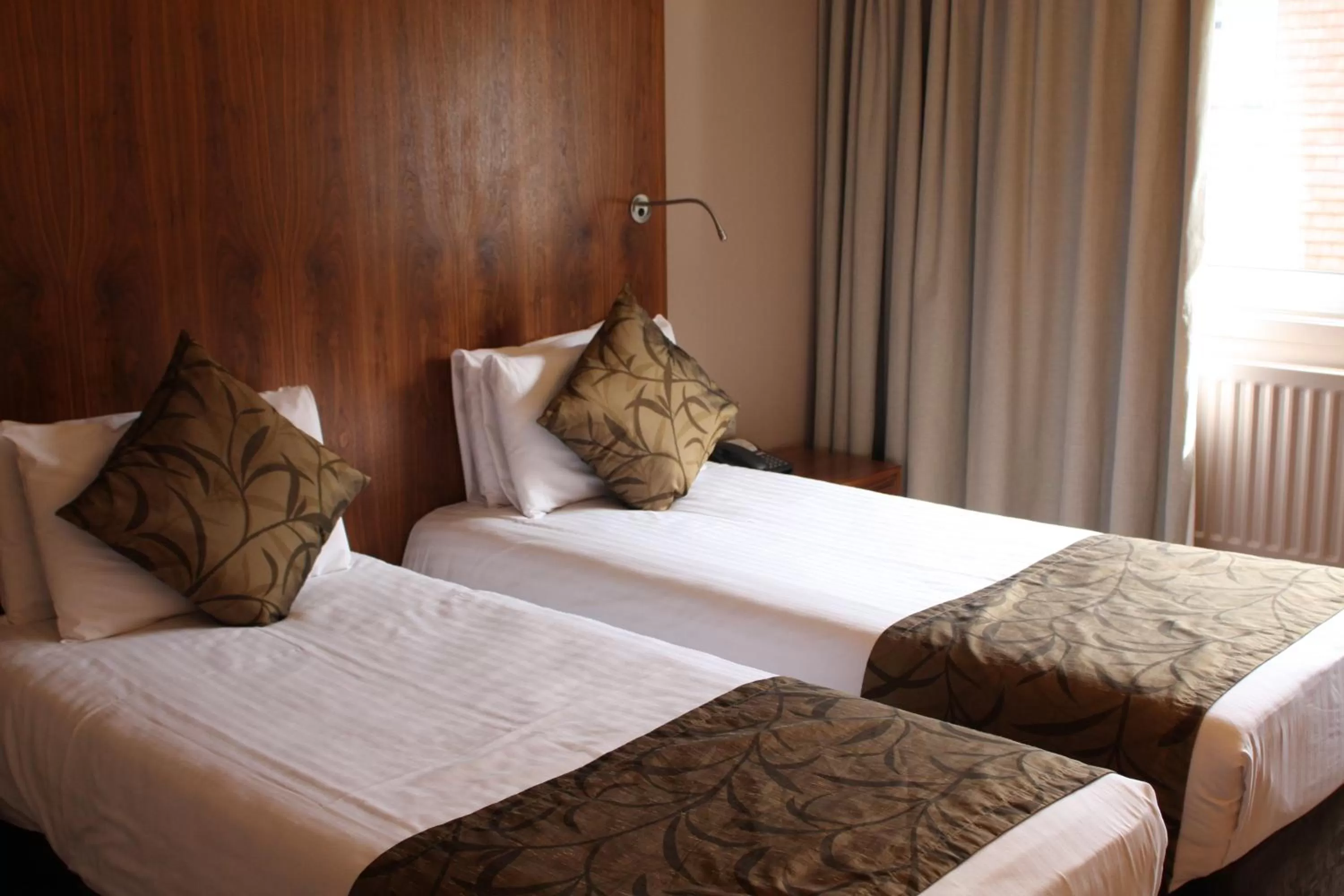 Bed in Aubrey Park Hotel