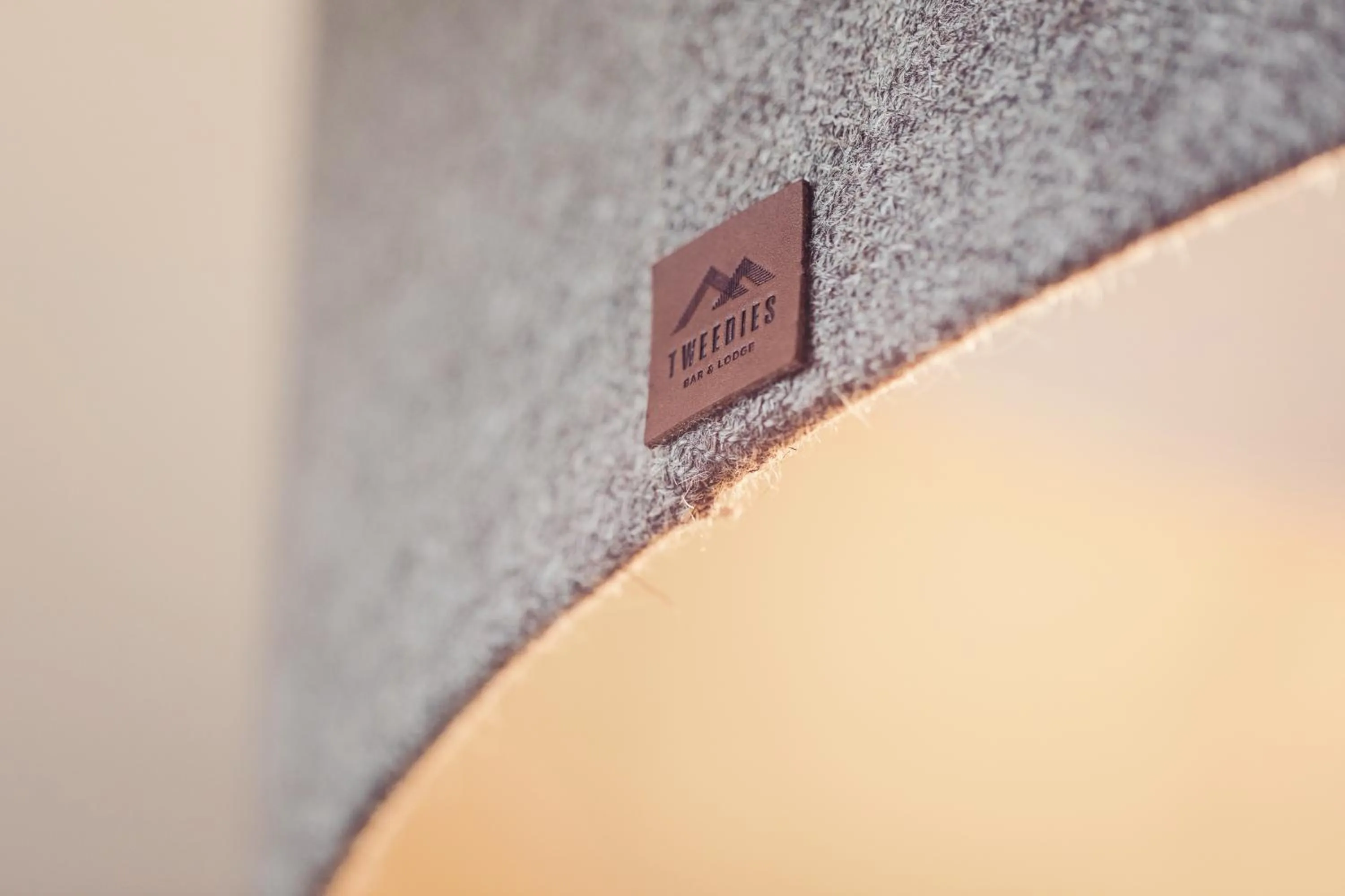 Property logo or sign in Tweedies Bar and Lodge