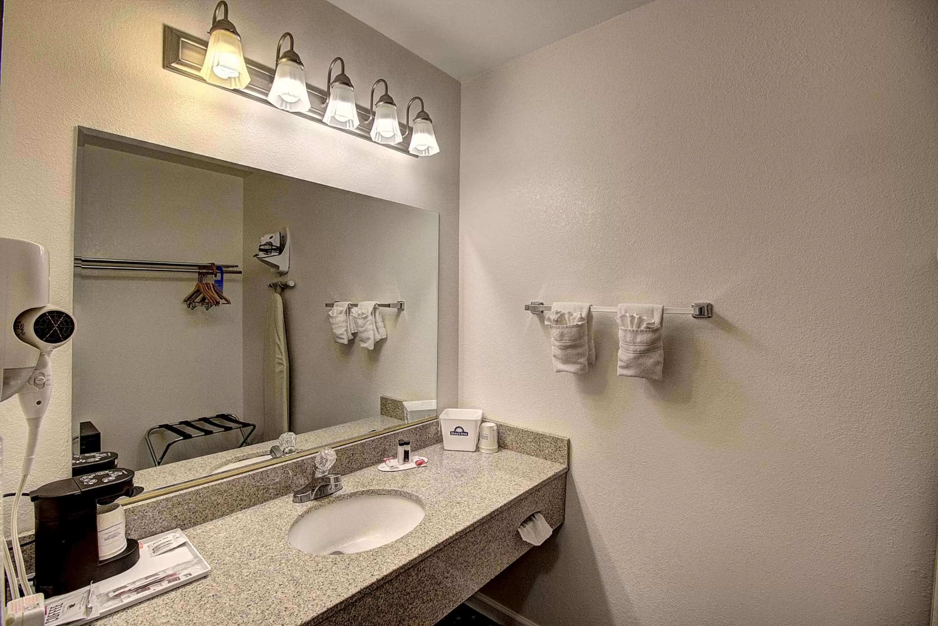 Bathroom in Days Inn & Suites by Wyndham Lolo