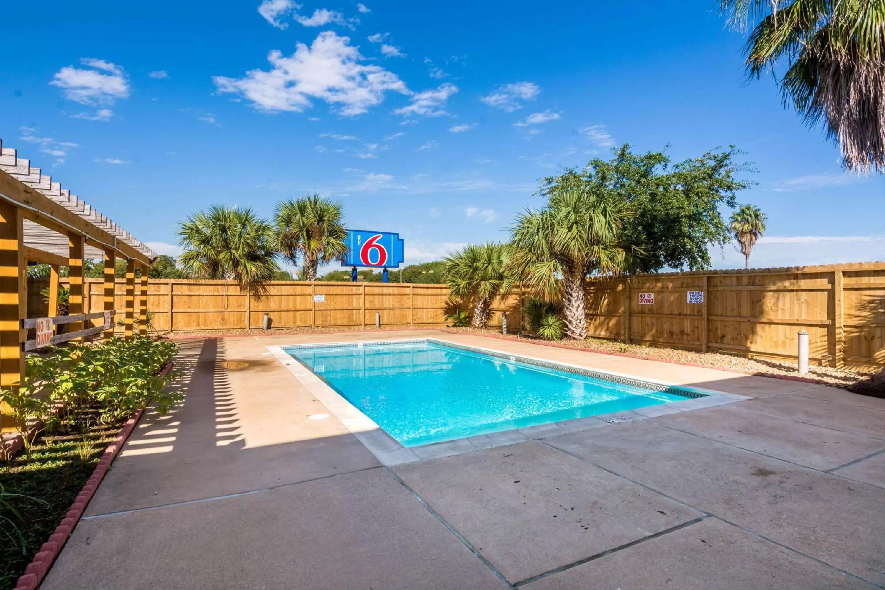 Property logo or sign in Motel 6-Freeport, TX