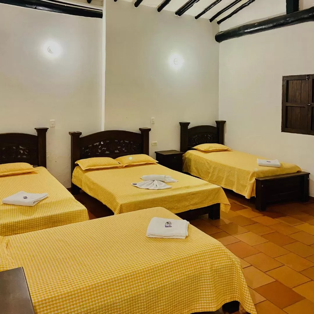 Bed in Hotel Hacienda Santa Barbara