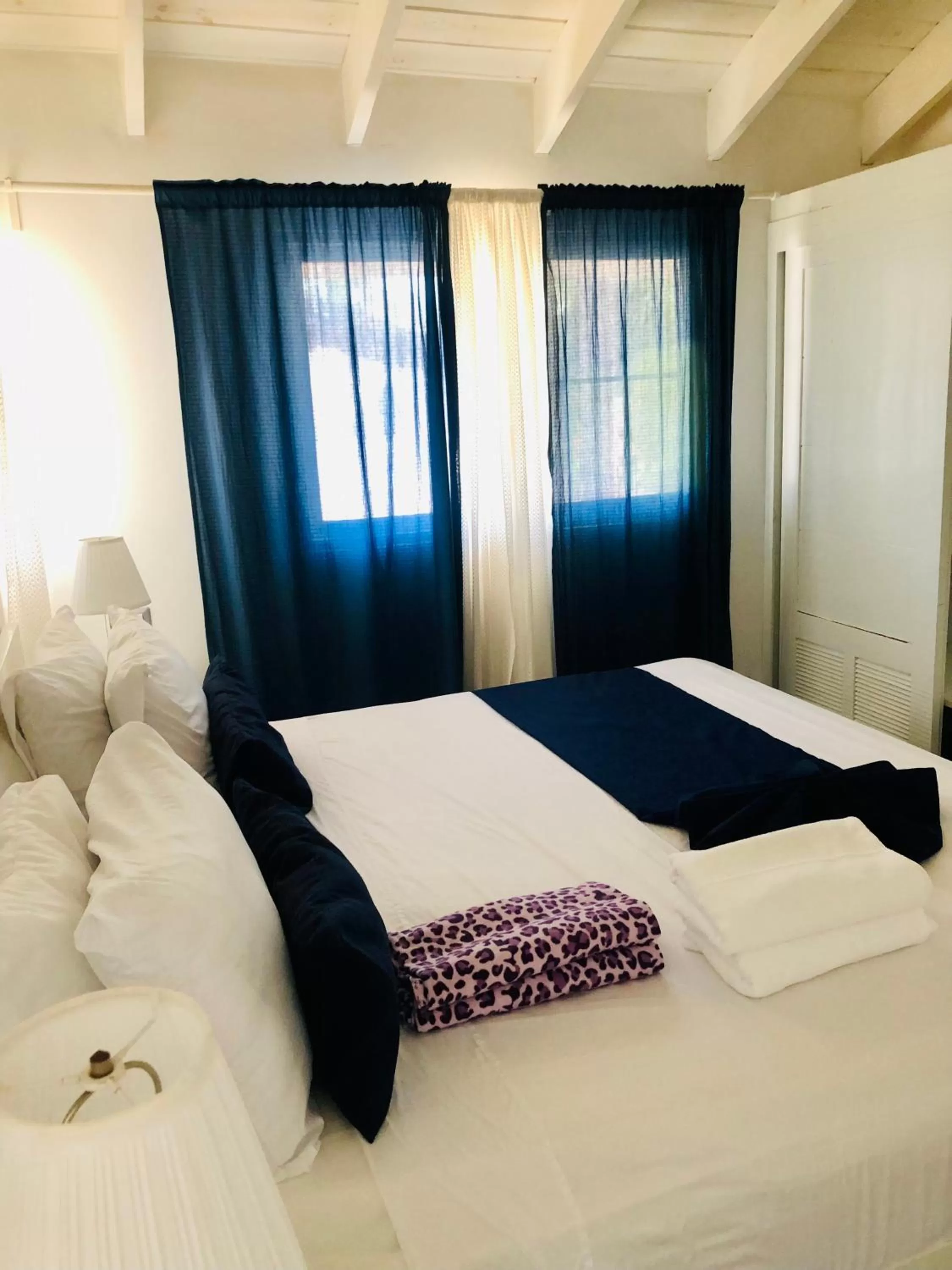 Bed in Los Corales Luxury Villas Beach Club and Spa