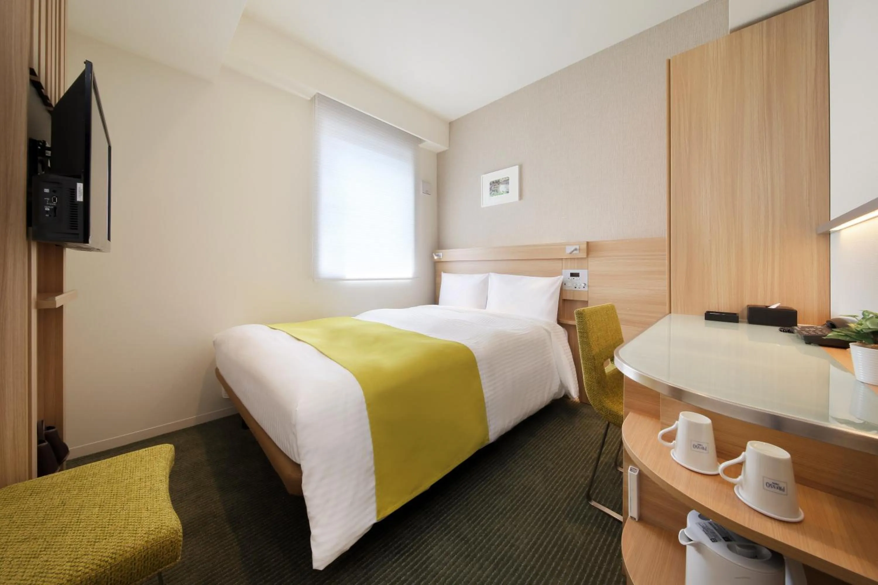 Bed in Keio Presso Inn Hamamatsucho