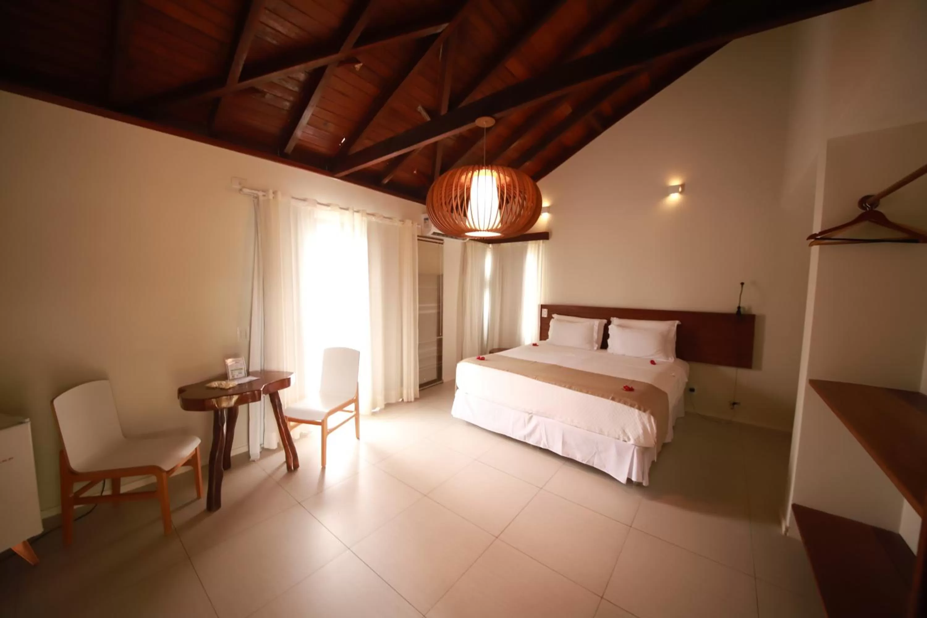 Photo of the whole room, Bed in Pousada Rangai
