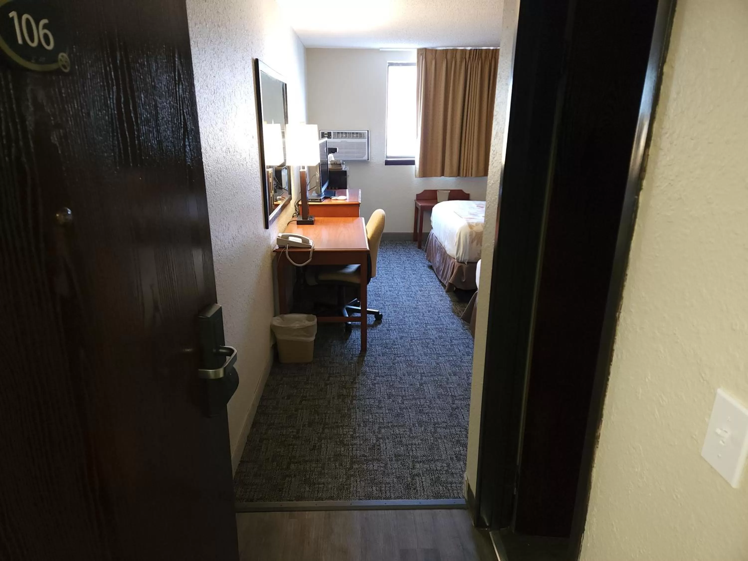 Bed in Bison Plains Lodge