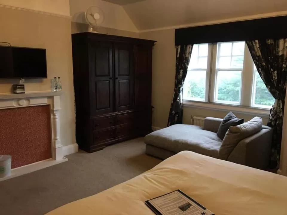 Bed in Brass Castle Country House Accommodation