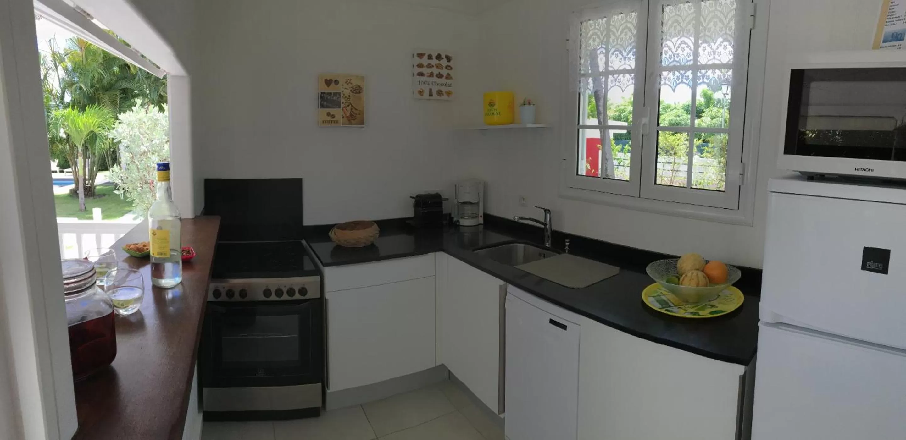 Kitchen or kitchenette, Kitchen/Kitchenette in Chambres d'hôtes et villas chez Flo